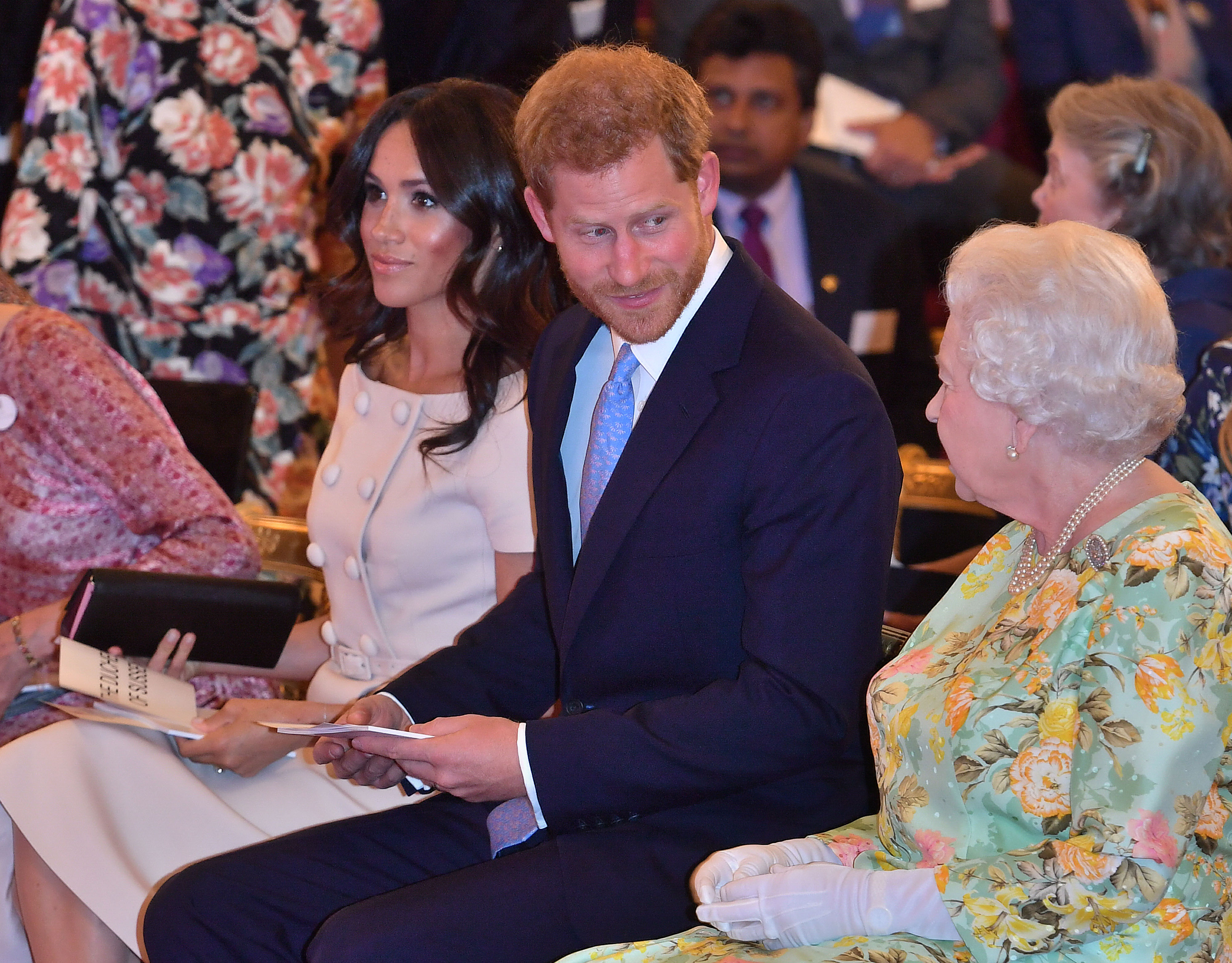 Meghan Markle, Prince Harry, and Queen Elizabeth II