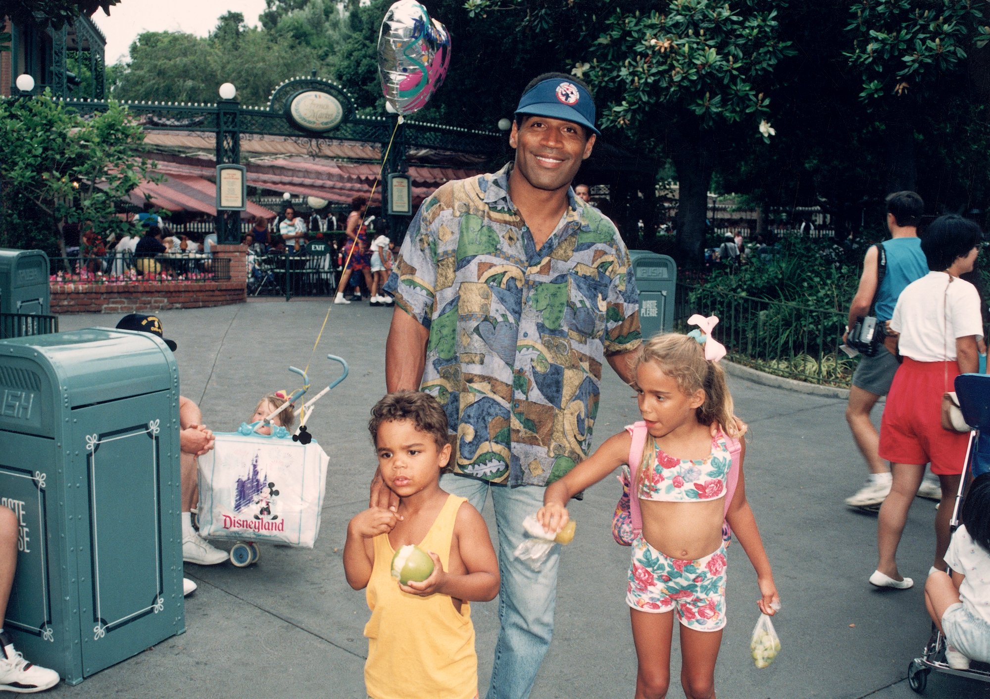 O.J. Simpson standing with his kids Justin (L) and Sydney (R)