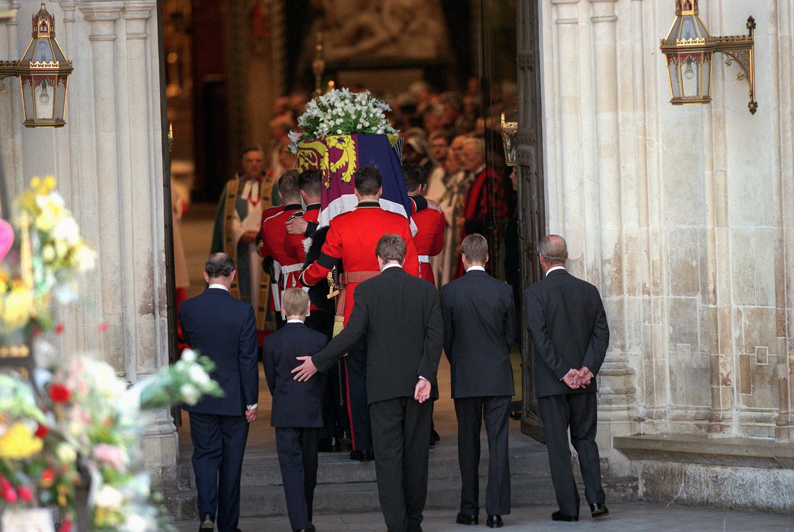 Prince Philip, Prince William, Earl Spencer, Prince Harry, and Prince Charles following Diana's casket into church