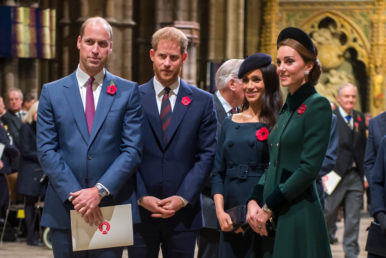 Prince William, Prince Harry, Meghan Markle, and Kate Middleton stand together at Westminster Abbey