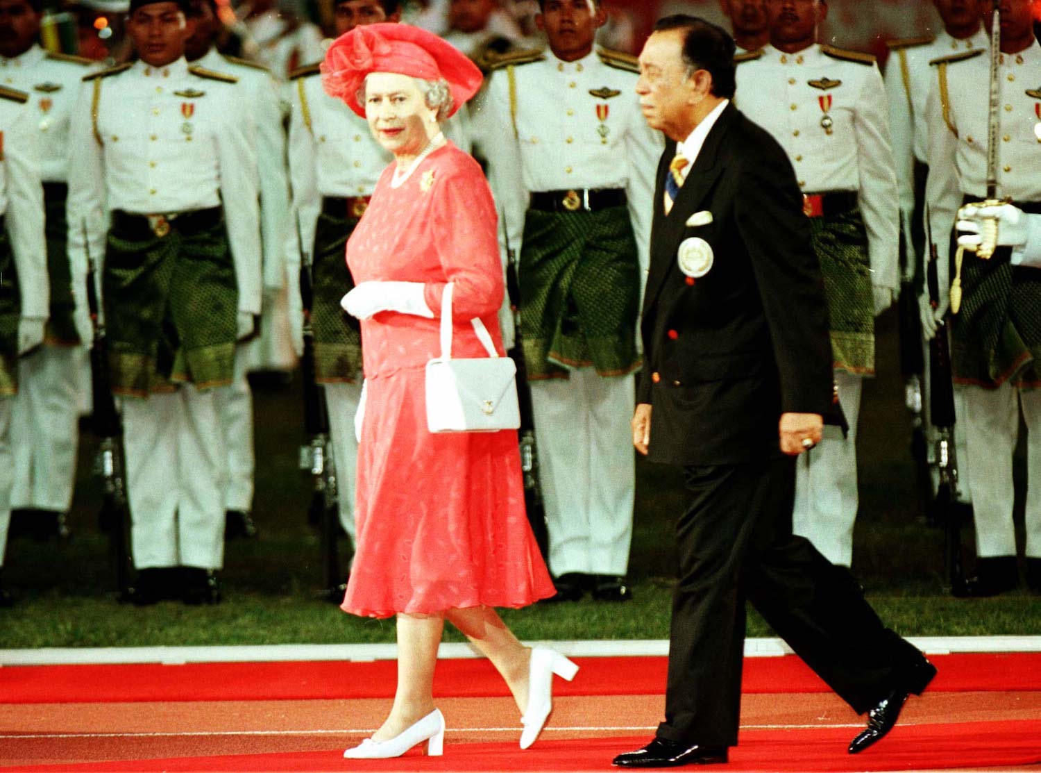 Queen Elizabeth II and Raja Permaisuri at the Commonwealth Games