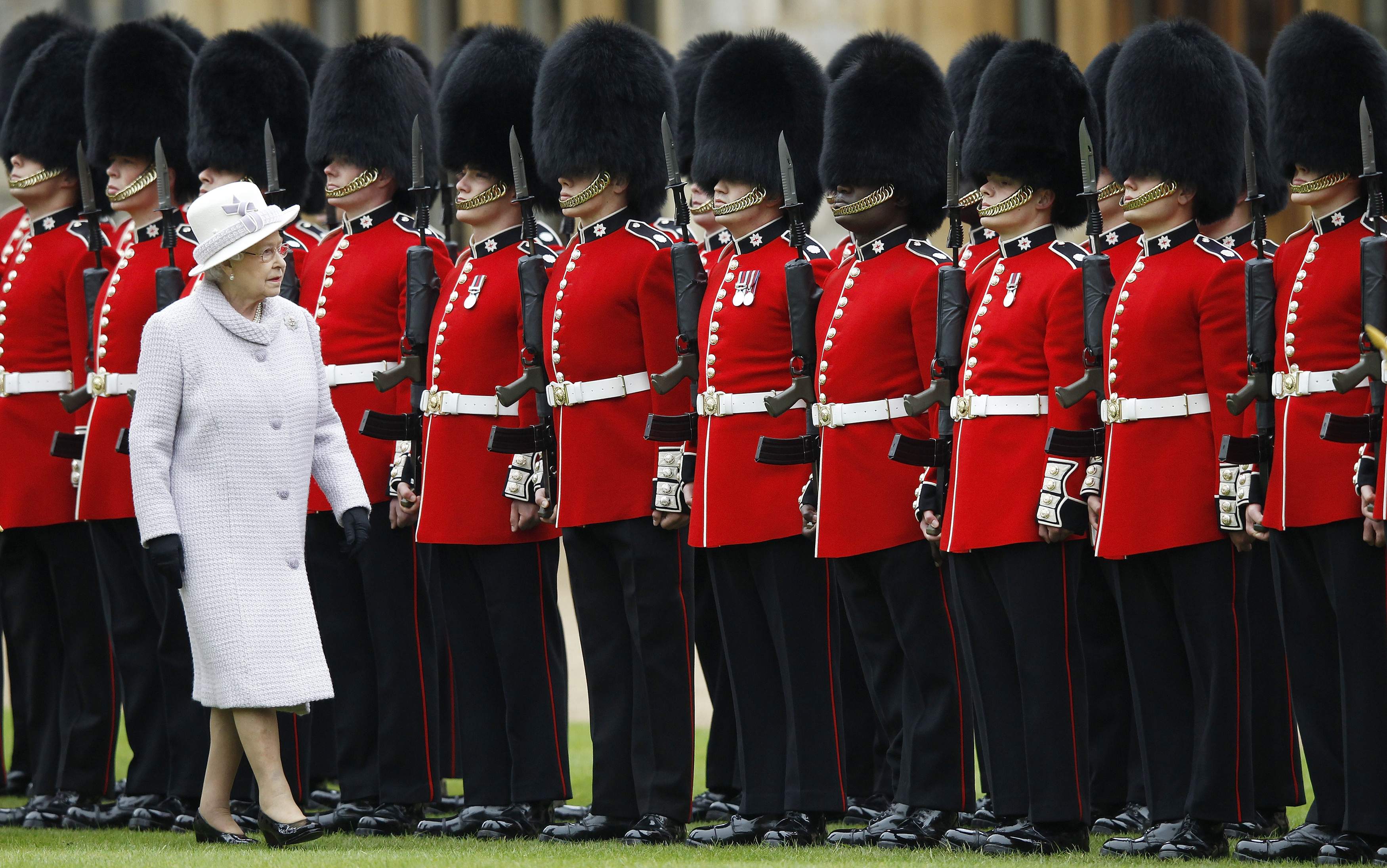 Queen Elizabeth II inspects guards
