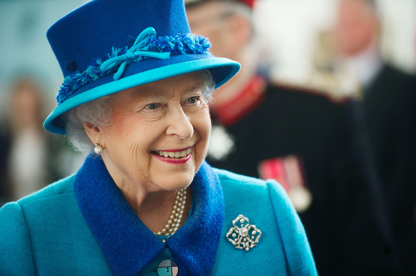Queen Elizabeth II smiles during a visit to Wales