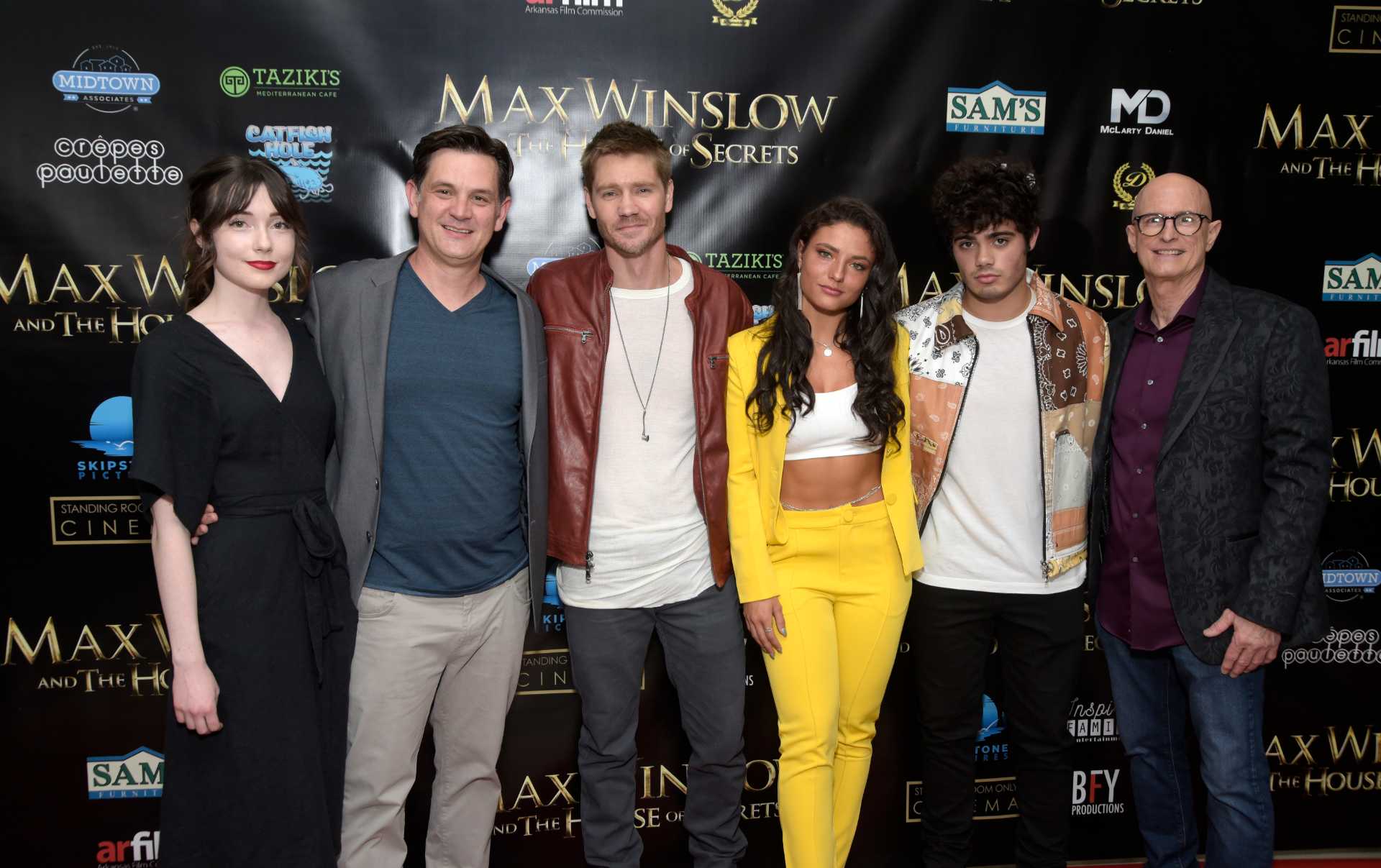 Sydne Mikelle (far left) at a screening of "Max Winslow And The House of Secrets" | Michael Tullberg/Getty Images