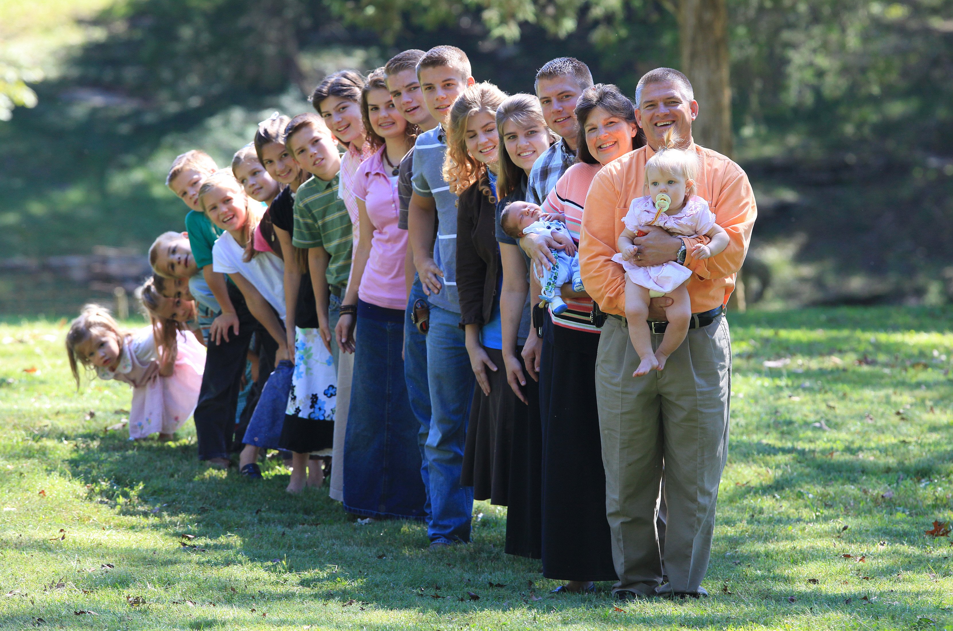 The Bates family poses for promotional photos for 'Bringing Up Bates' 