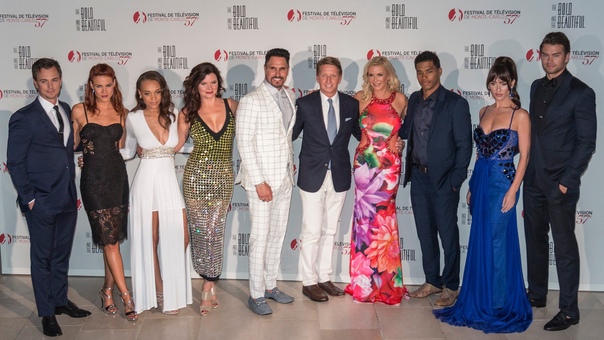 (L-R) Darren Brooks, Kelly Kruger, Reign Edwards, Heather Tom, Don Diamont, Katherine Kelly Lang, Rome Flynn, Jacqueline MacInnes Wood and Pierson Fode pose with Head Writer and Executive Producer Bradley Bell