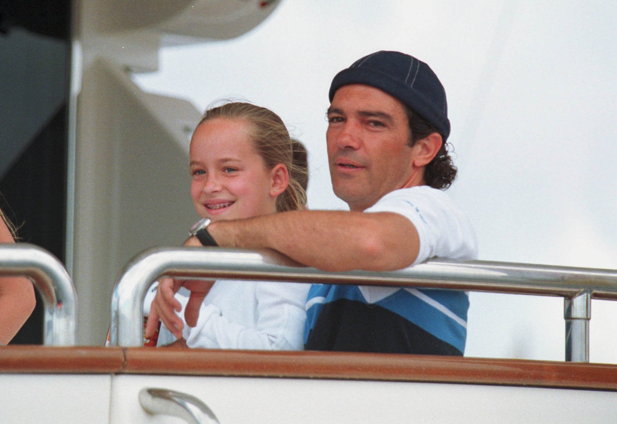 Antonio Banderas with Dakota Johnson on a yacht during the Copa del Ray regatta, August 06, 2000.