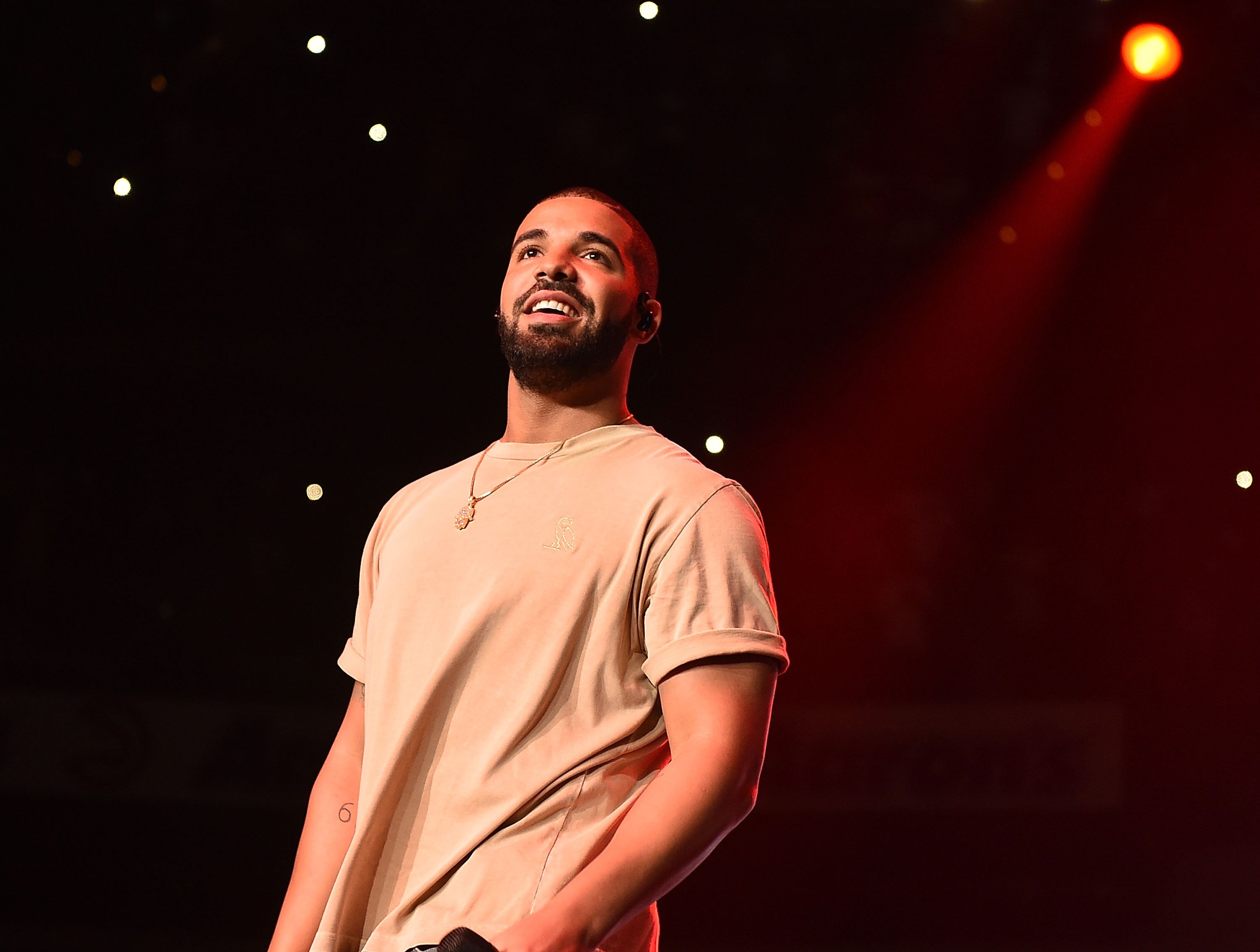 Drake wearing a necklace