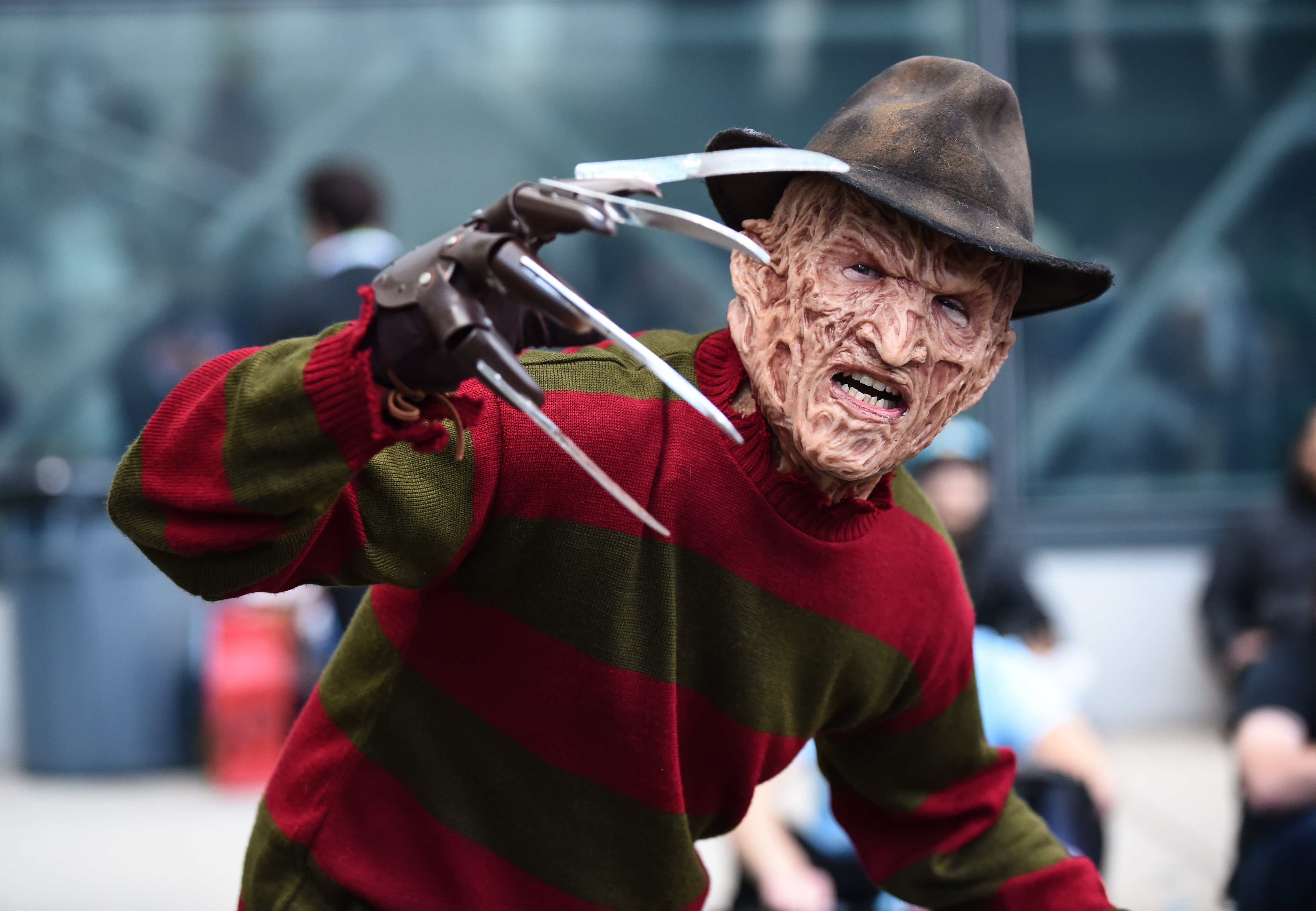 A cosplayer dressed as Freddy Krueger from A Nightmare on Elm Street