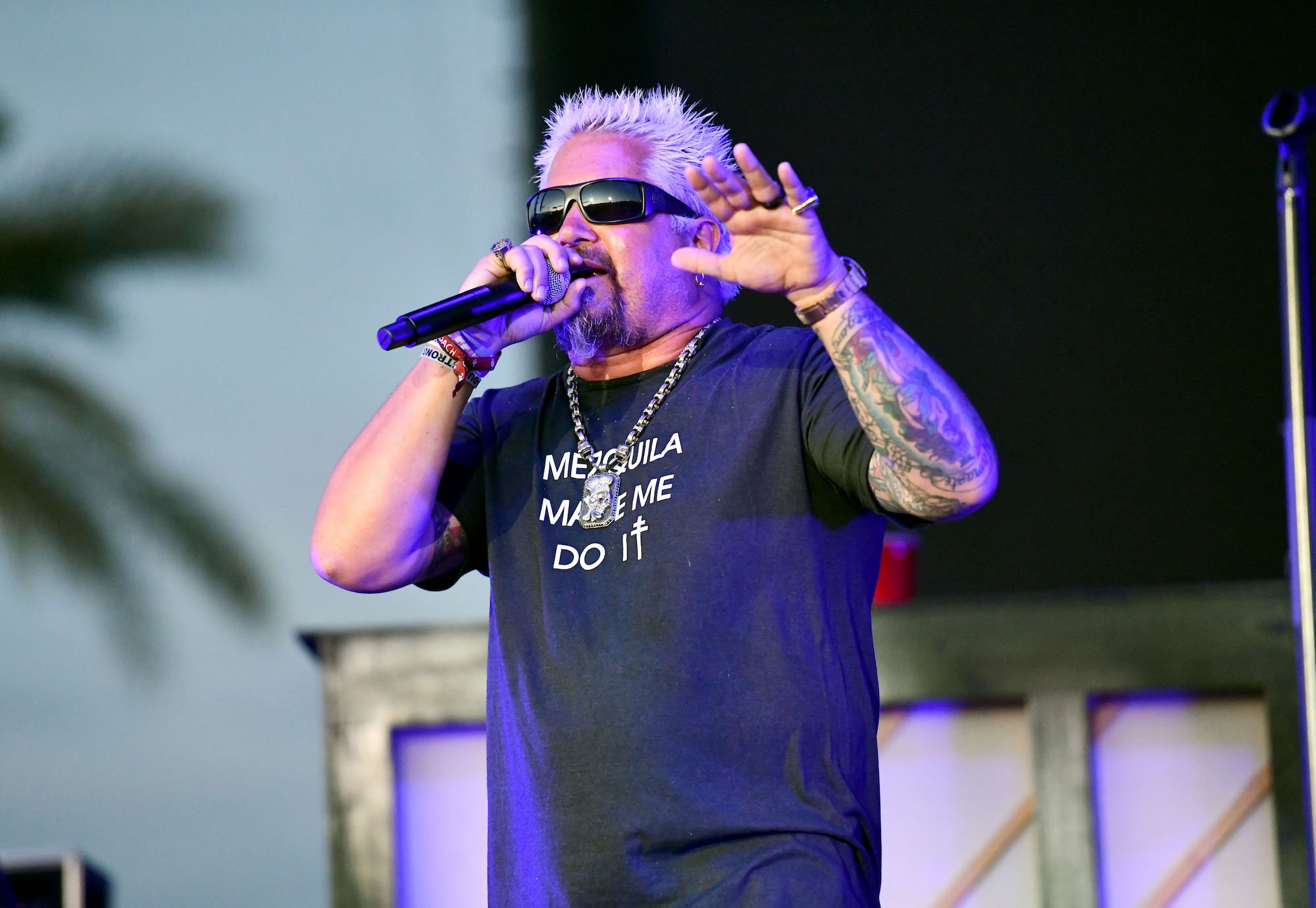 Guy Fieri speaks onstage