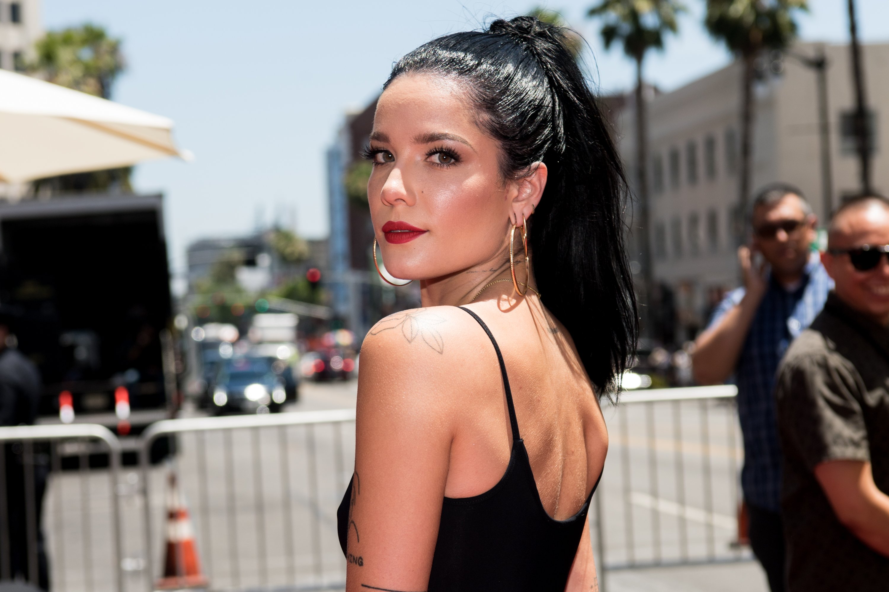 Halsey wearing earrings