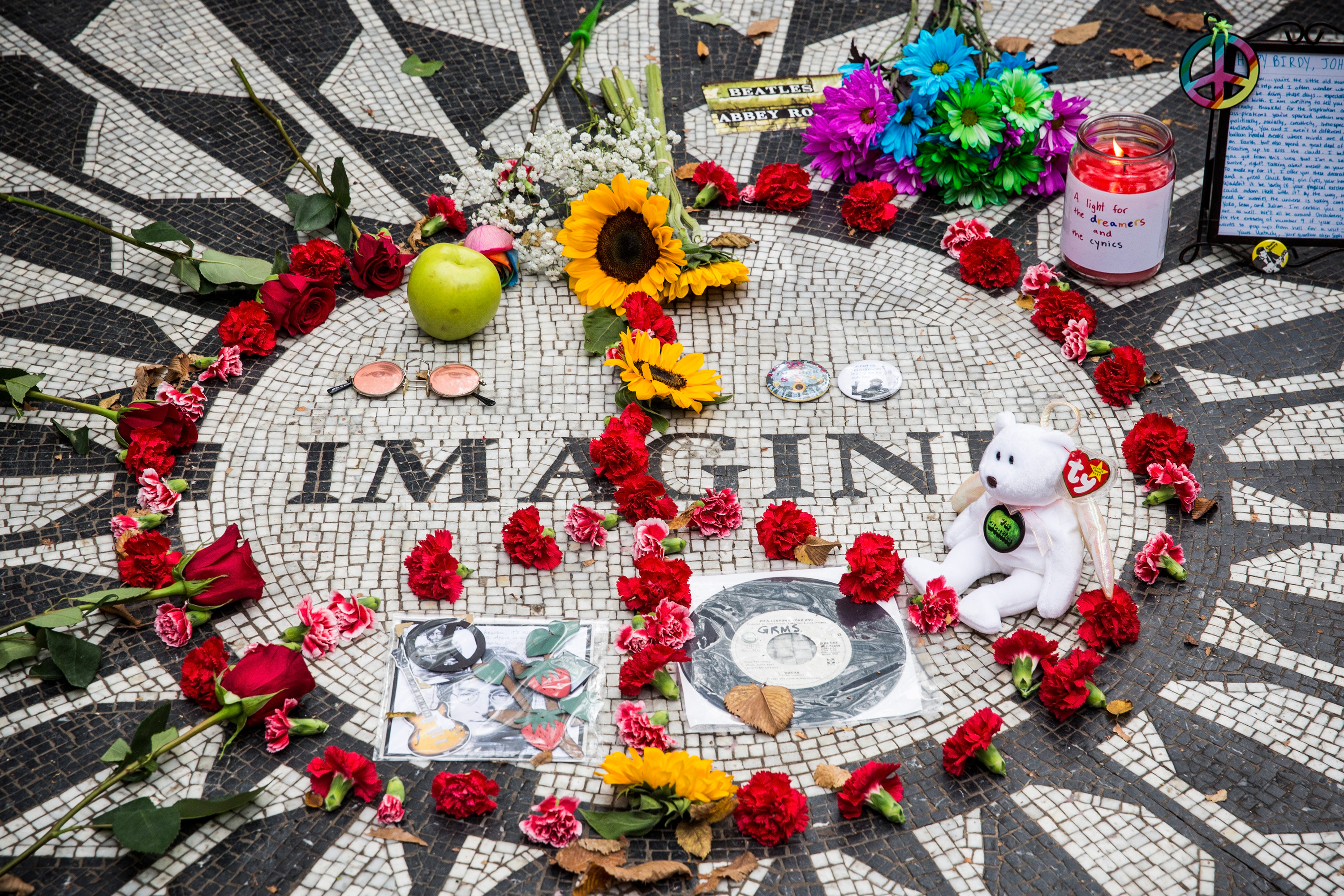 A memorial to John Lennon with a peace sign on it