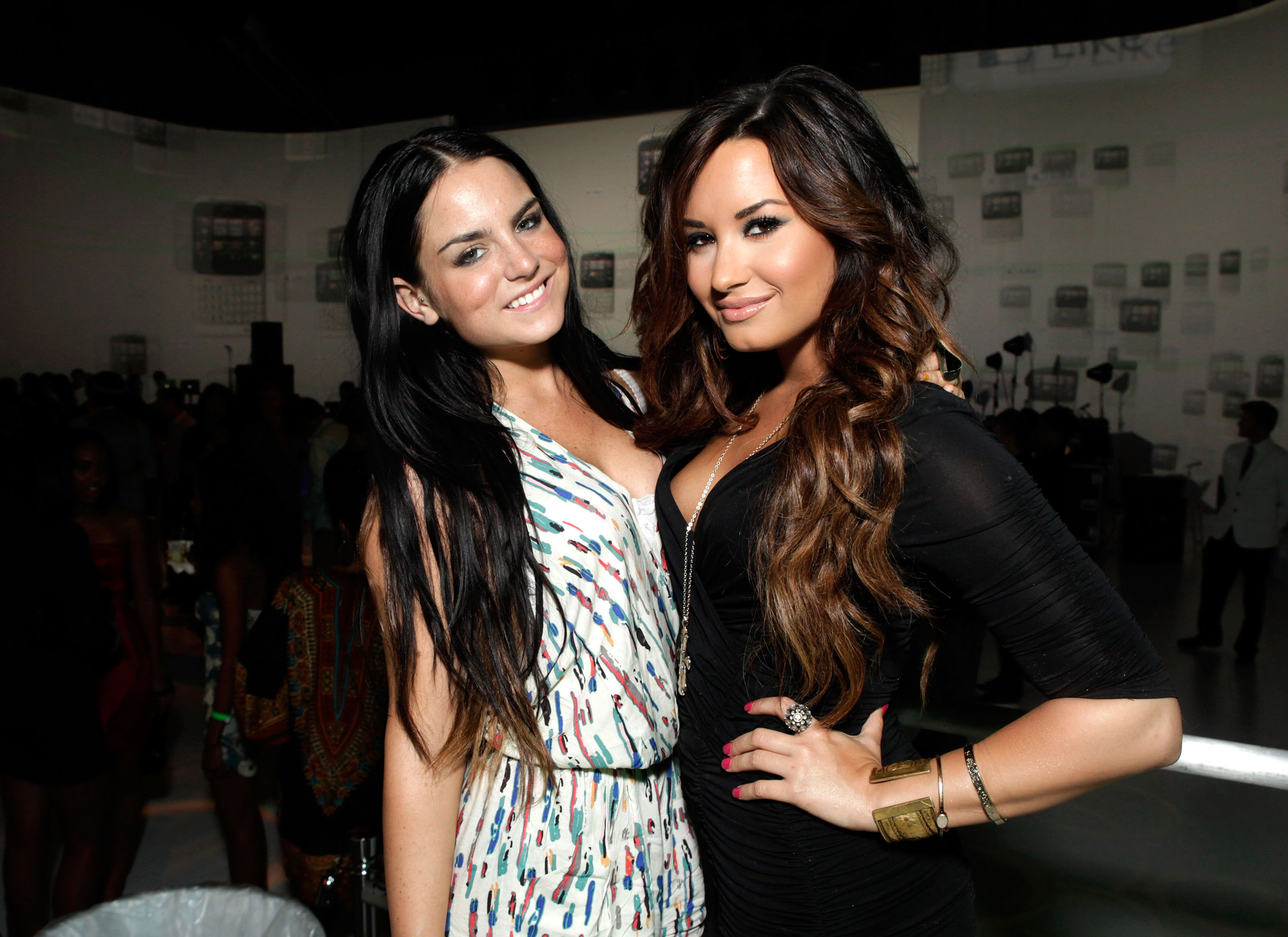 Singer JoJo (L) and singer/actress Demi Lovato attend the "HTC Status Social" Launch Event With Usher at Paramount Studios on July 19, 2011 in Hollywood, California. 