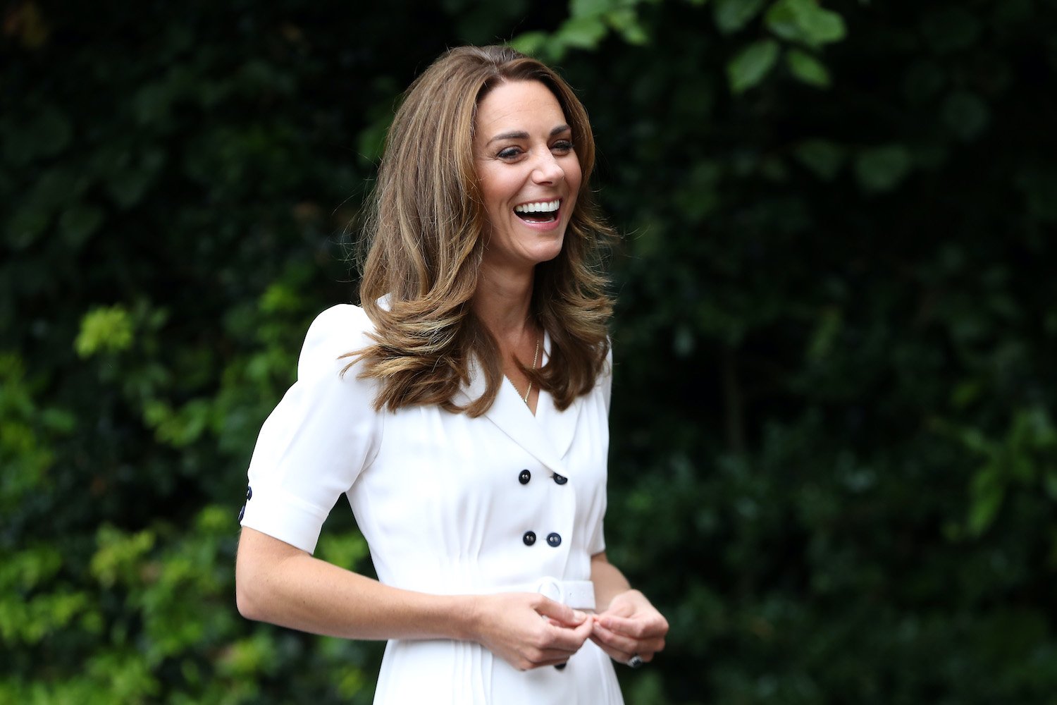 Kate Middleton talks to CEO Baby Basics UK Cat Ross, Founder of Abernecessities Danielle Flecher-Horn and CEO Little Village Sophia Parker during a visit to Baby Basic UK