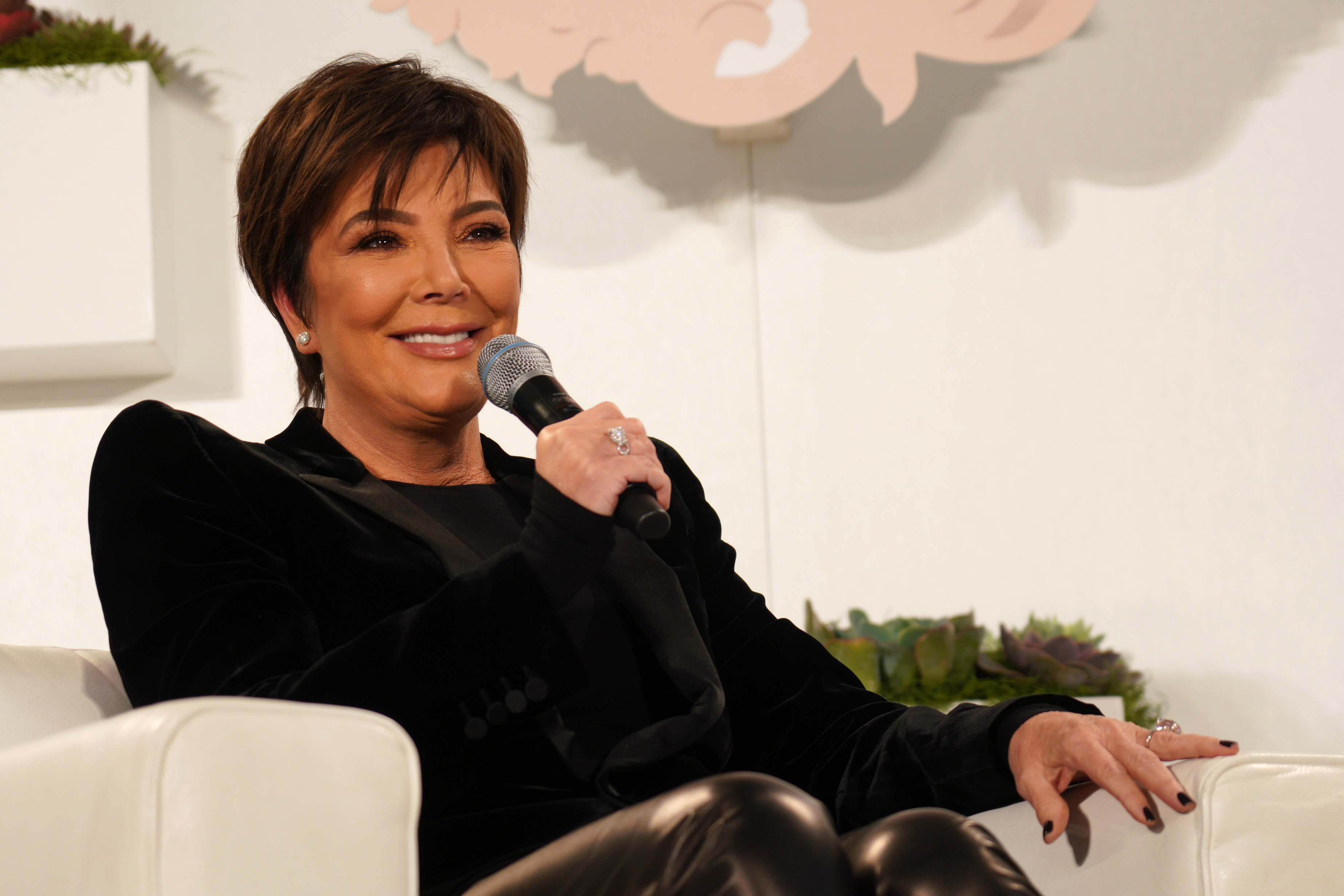 Kris Jenner with microphone 