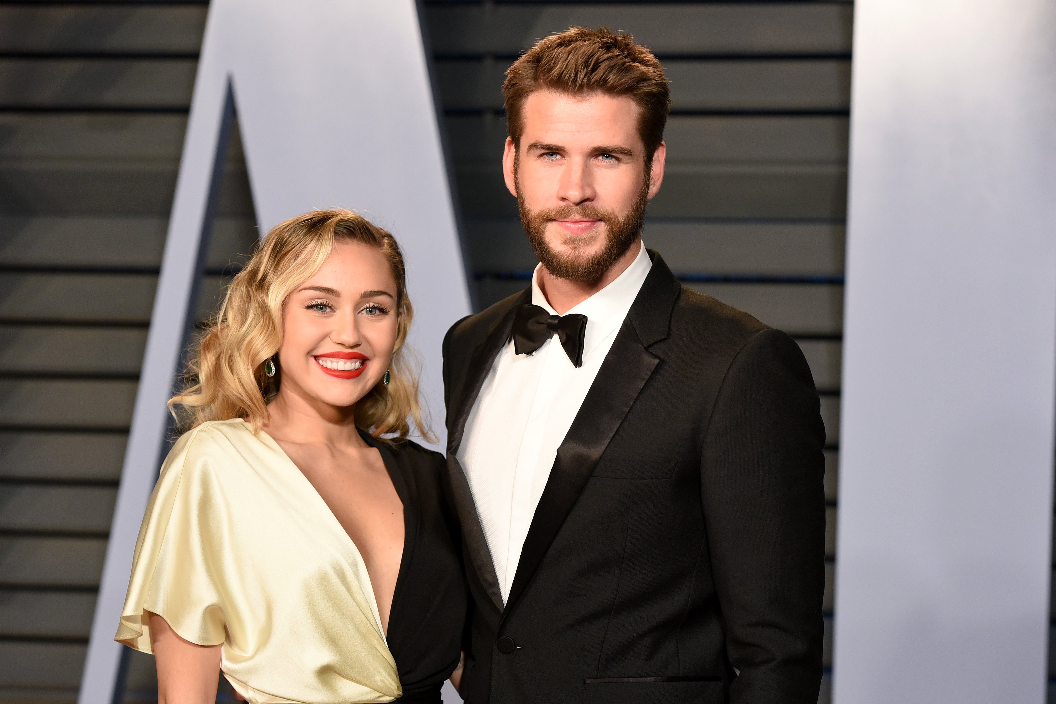 Miley Cyrus and Liam Hemsworth attend the 2018 Vanity Fair Oscar Party on March 4, 2018 in Beverly Hills, CA.