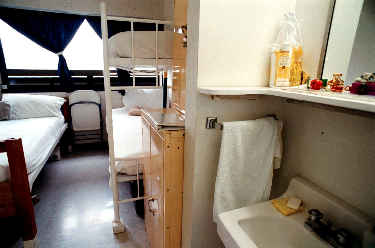 Inside of a prison cell with bunks