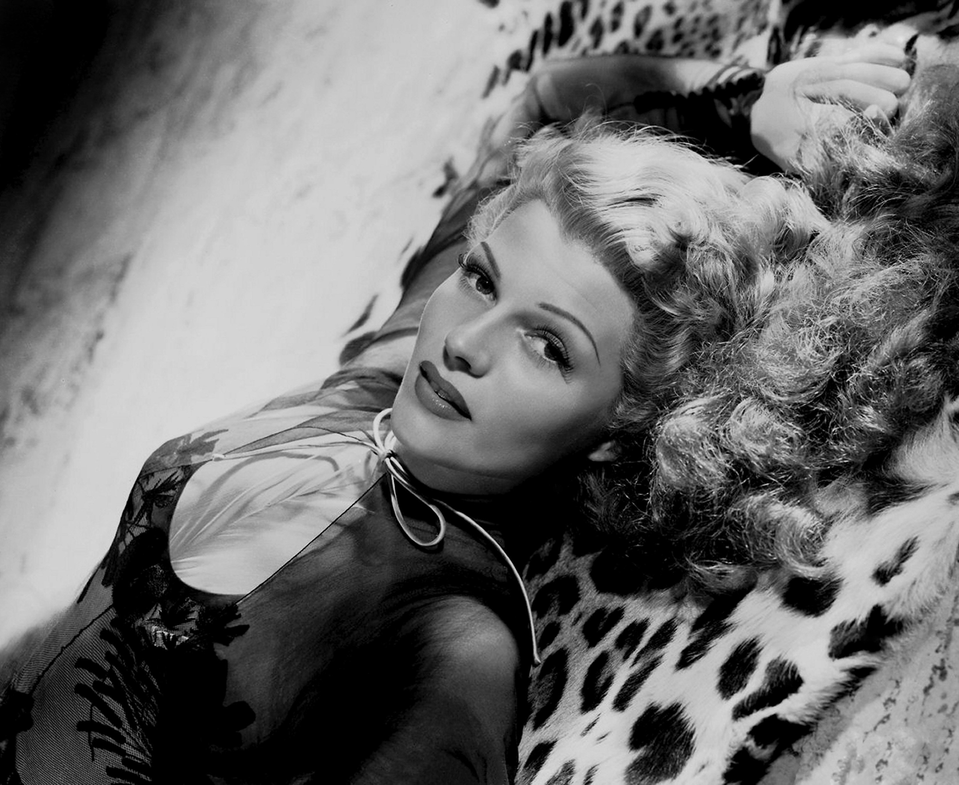 Lauren Bacall lying on the floor
