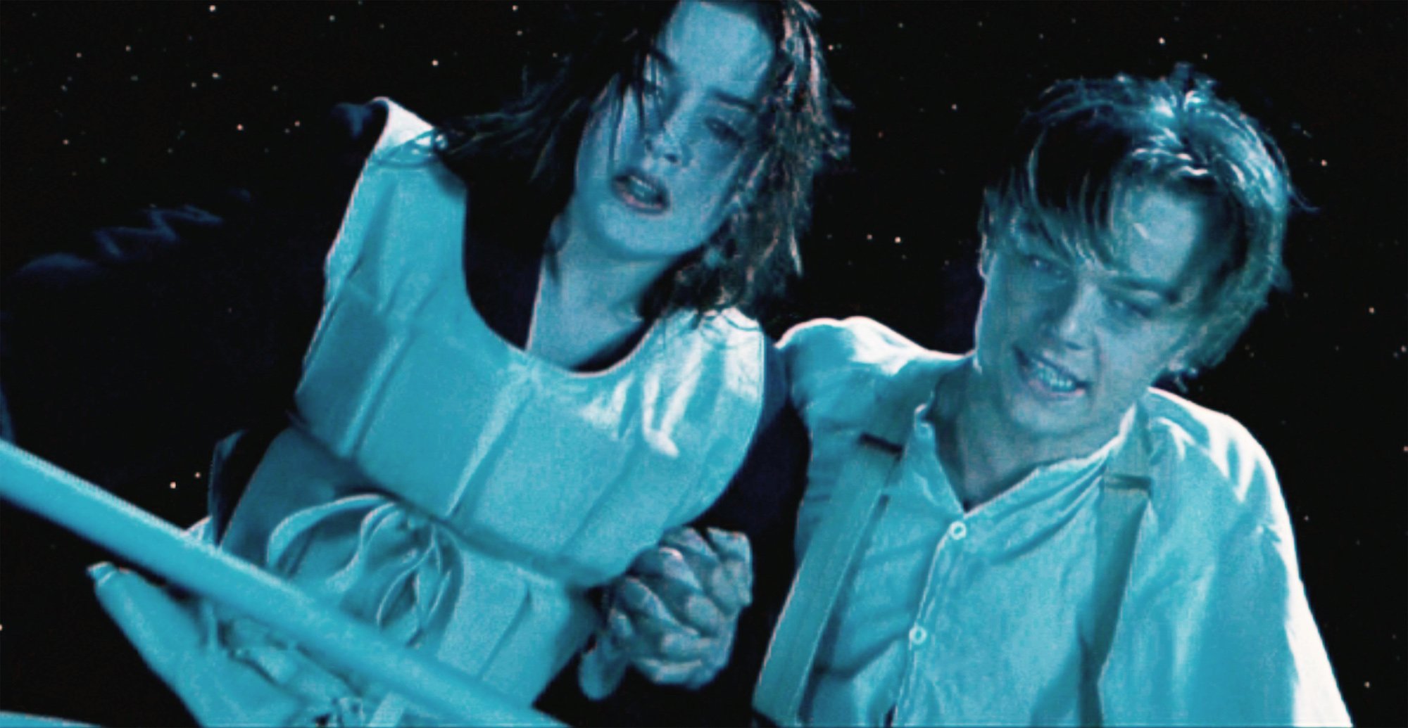 Rose (Kate Winslet) and Jack (Leonardo DiCaprio) on the Titanic, as the ship plunges into the water below.