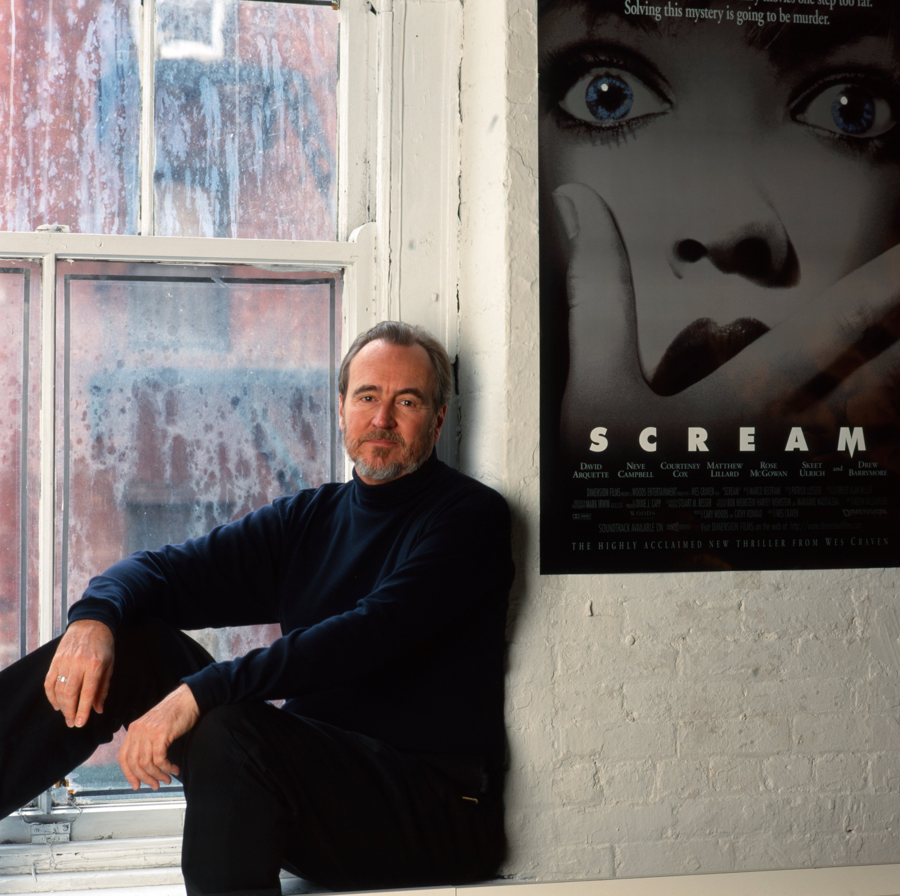 Wes Craven by a Scream poster