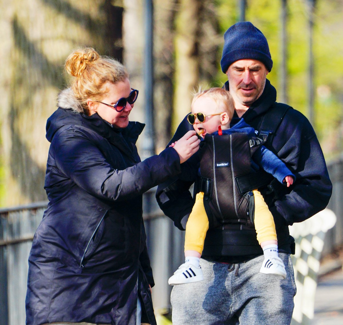 Amy Schumer and Chris Fischer take baby Gene Fischer out for some morning air
