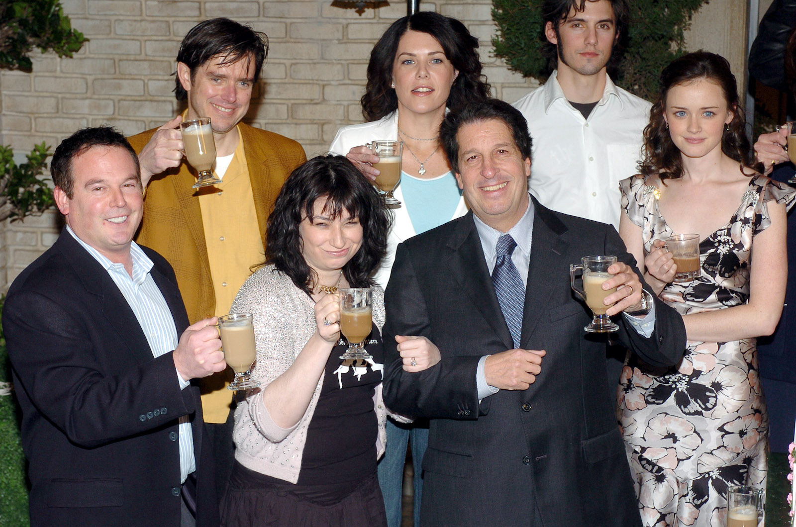 Front: David Janollari, president of WB Entertainment, Amy Sherman, executive producer, Peter Roth, president of Warner Bros. Television and Alexis Bledel Back: Daniel Palladino, executive producer, Lauren Graham and Milo Ventimiglia