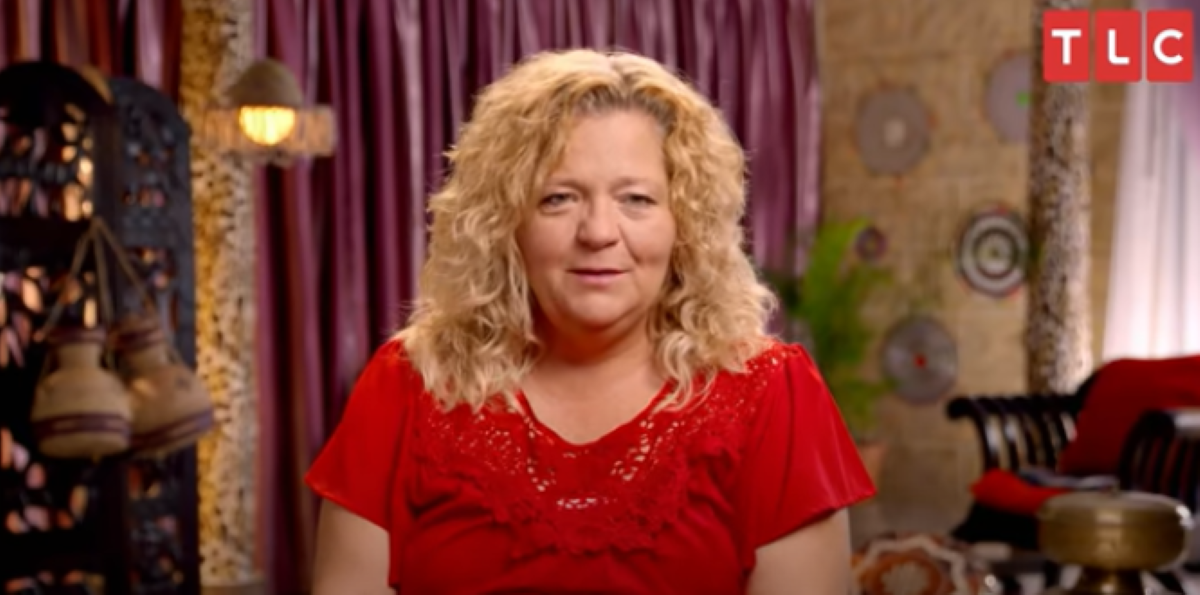 Lisa Hamme sits in red shirt amid rumors she's married