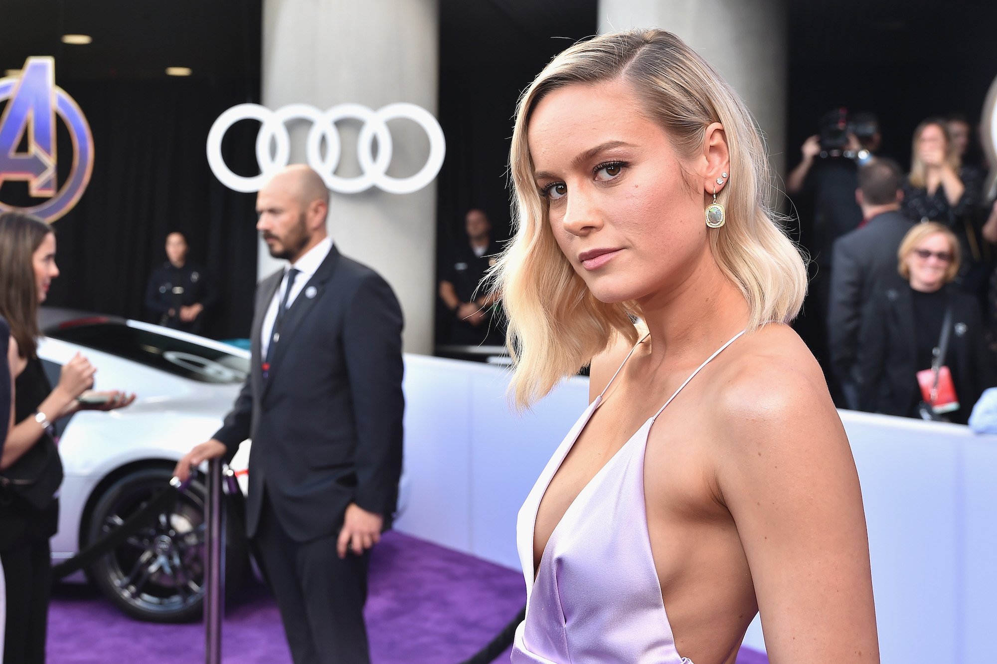 Brie Larson slightly smiling, turned toward the camera