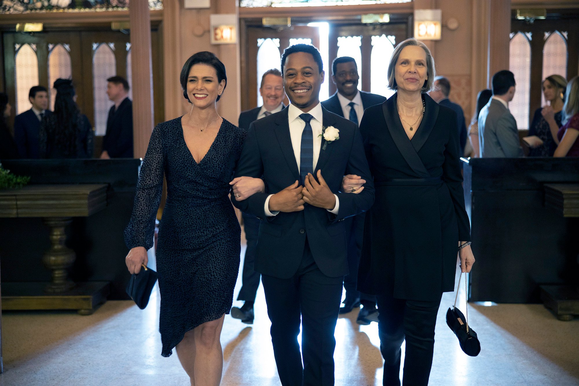 (L-R)Melissa Ponzio as Donna Boden, Daniel Kyri as Darren Ritter, Amy Morton as Trudy Platt walking into an event