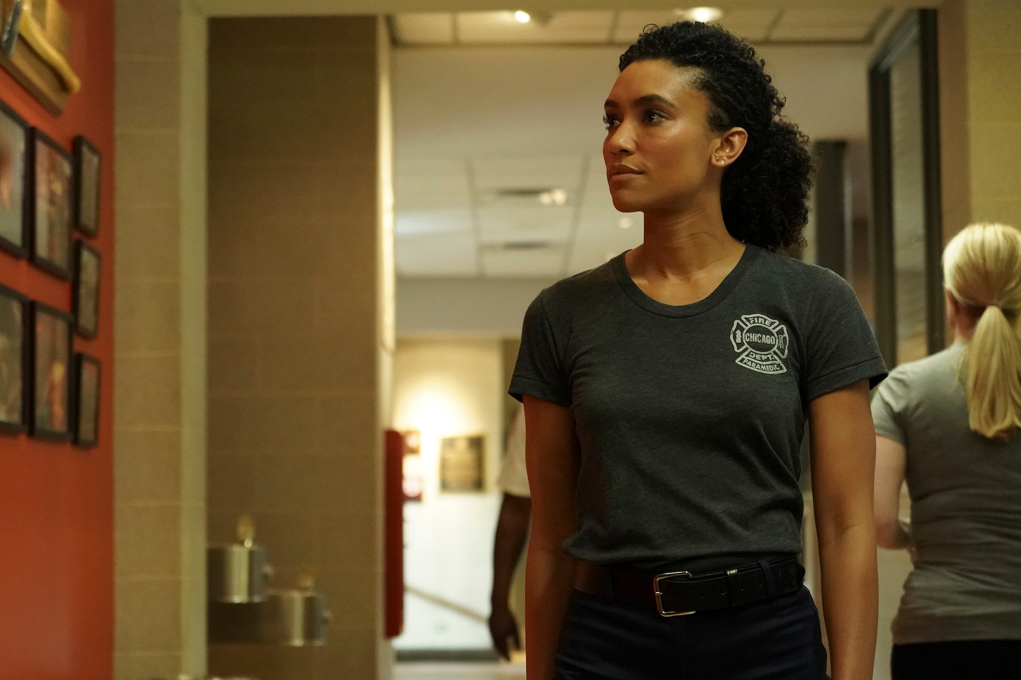 Annie Ilonzeh as Emily Foster looking to the side