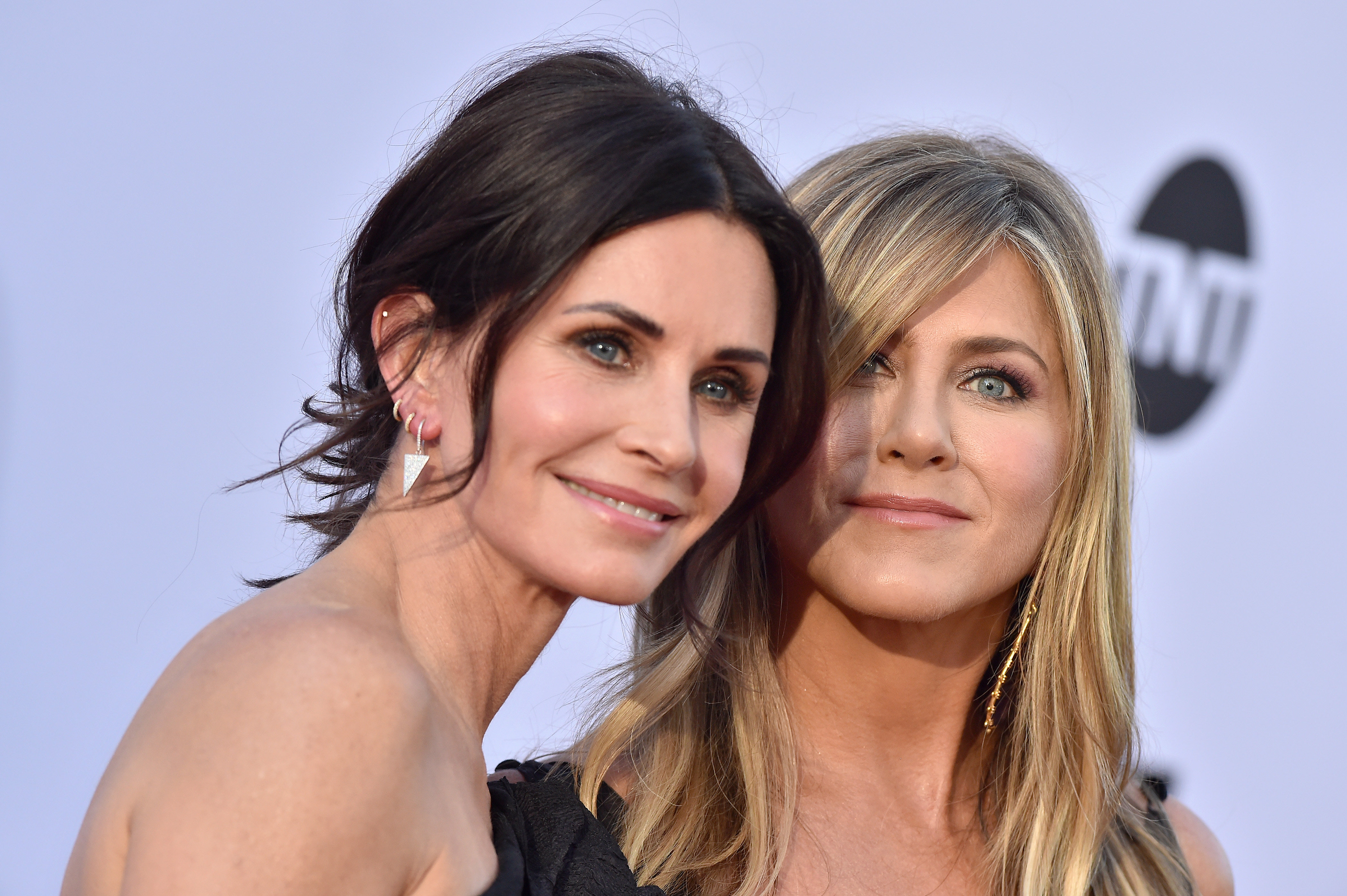 Courteney Cox and Jennifer Aniston arrive at the American Film Institute's 46th Life Achievement Award Gala Tribute to George Clooney