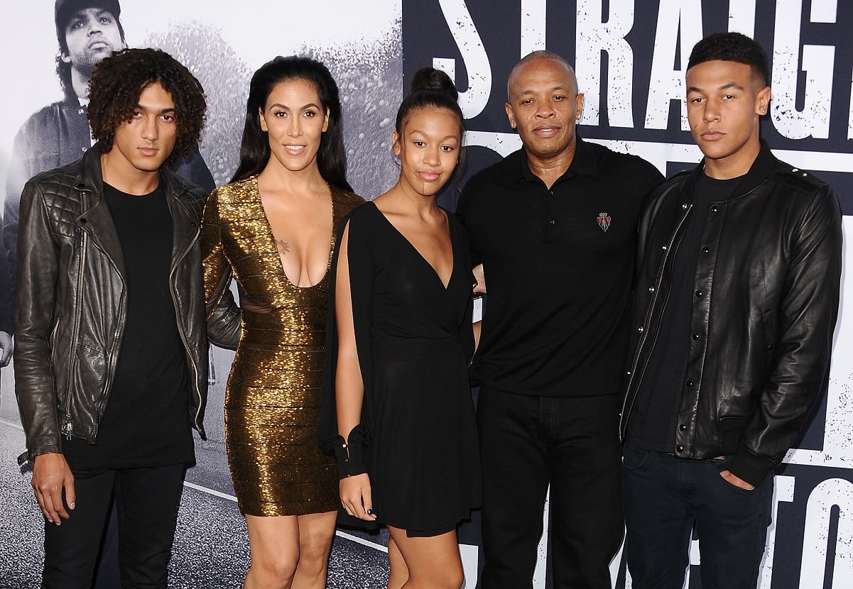 Dr. Dre with wife, Nicole Young, and three of his children