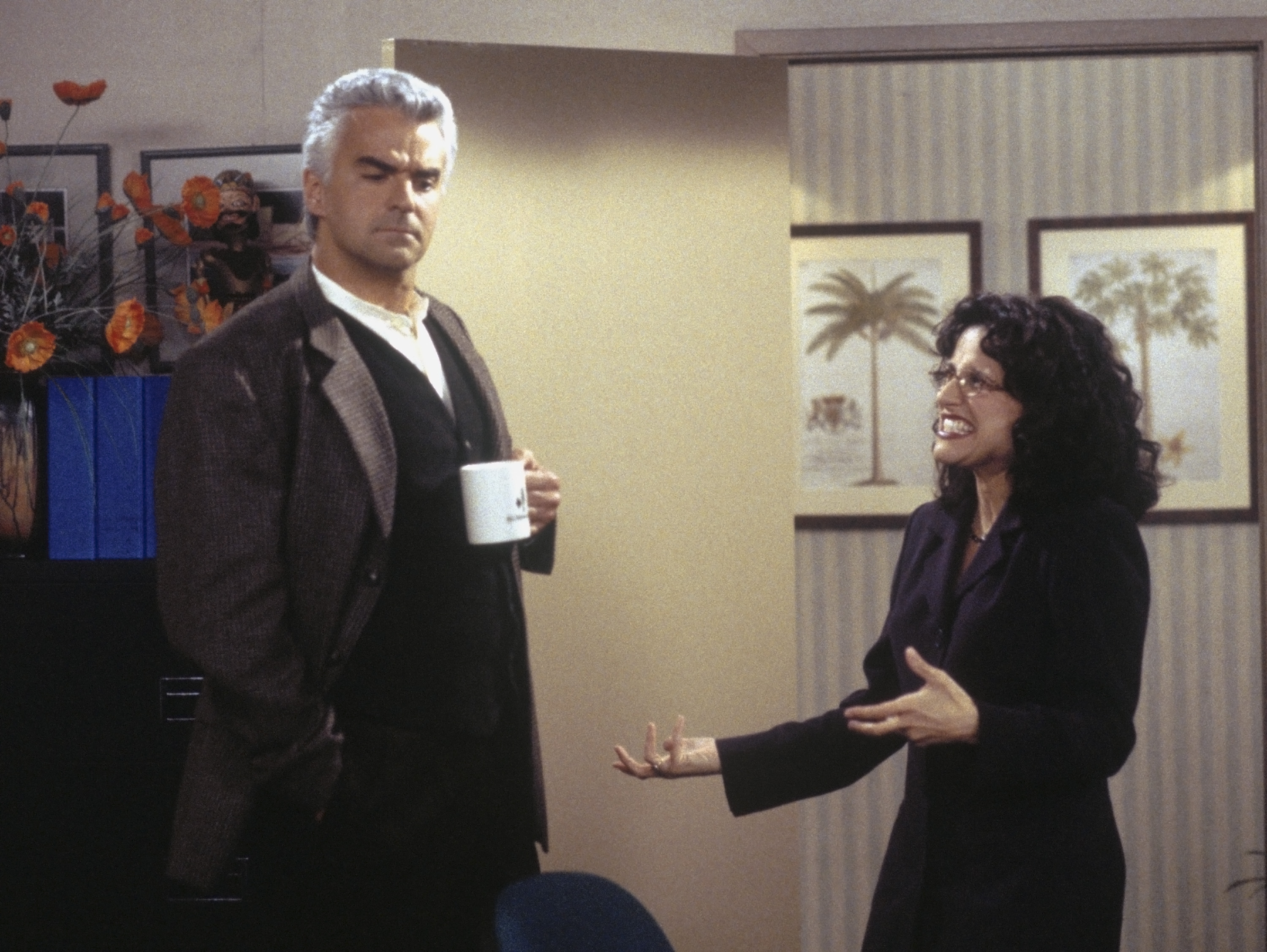 John O'Hurley (left) with Julia Louis-Dreyfus in a scene from 'Seinfeld'