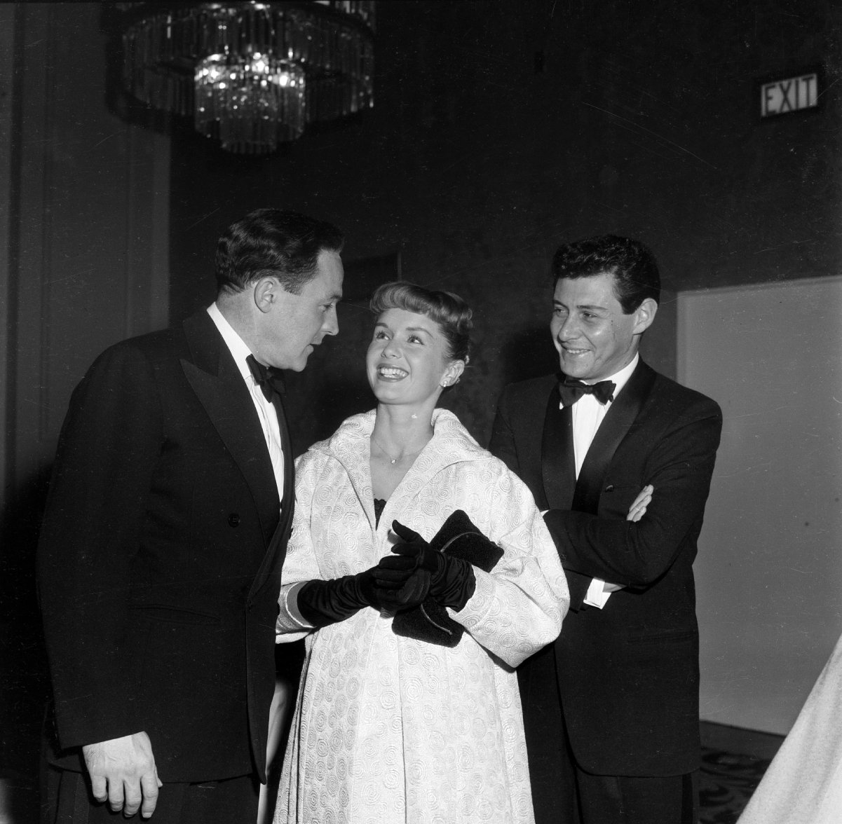 From left, Gene Kelly with Debbie Reynolds and her husband, Eddie Fisher in 1957