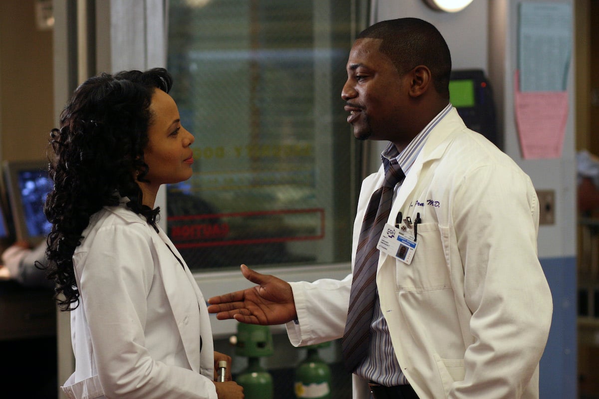 Gina Ravera as Bettina DeJesus and Mekhi Phifer as Gregory Pratt on ER