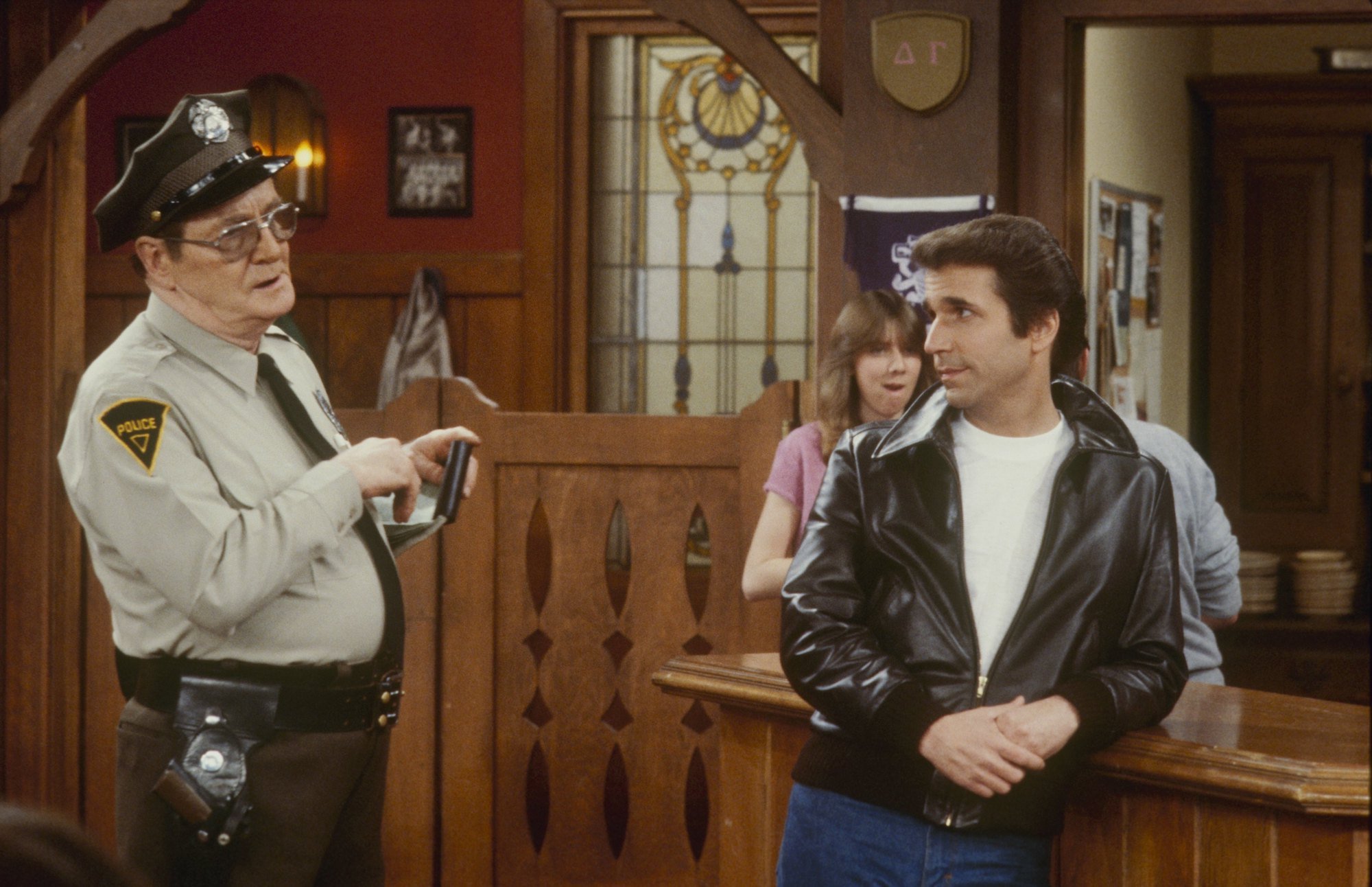 (L-R) Ed Peck and Henry Winkler on set of 'Happy Days'