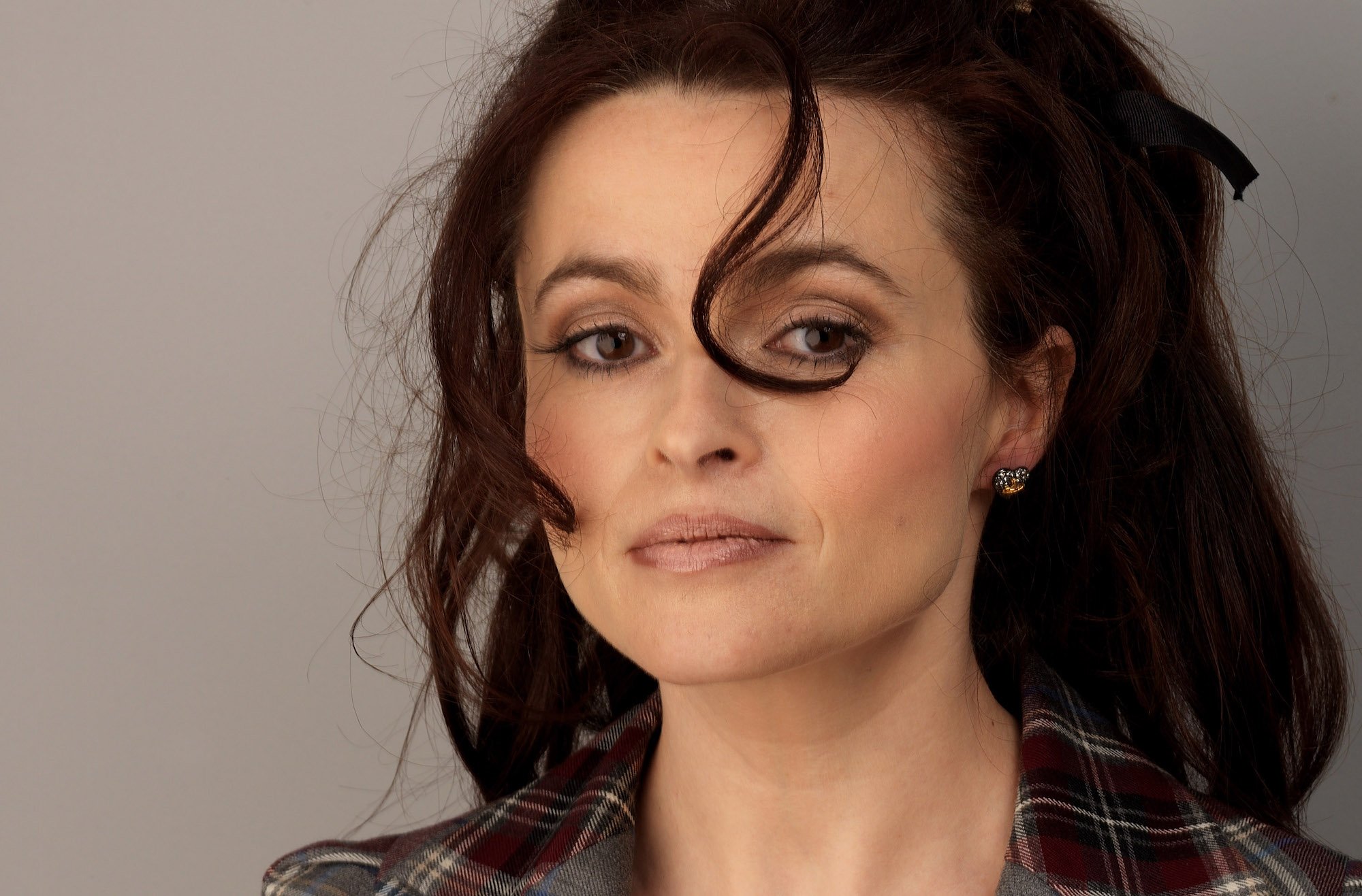 Helena Bonham Carter slightly smiling at the camera