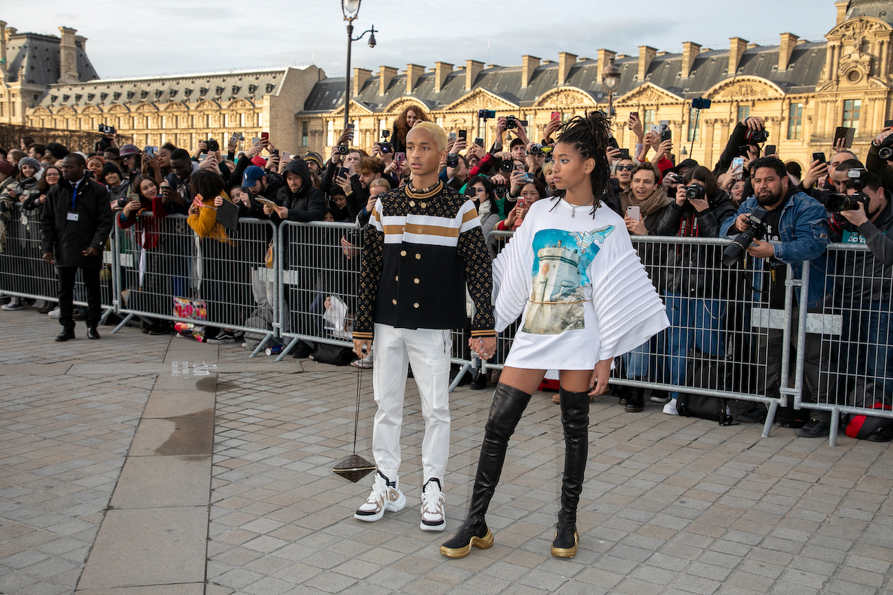 Willow Smith holds hands with brother Jaden at Louis Vuitton PFW