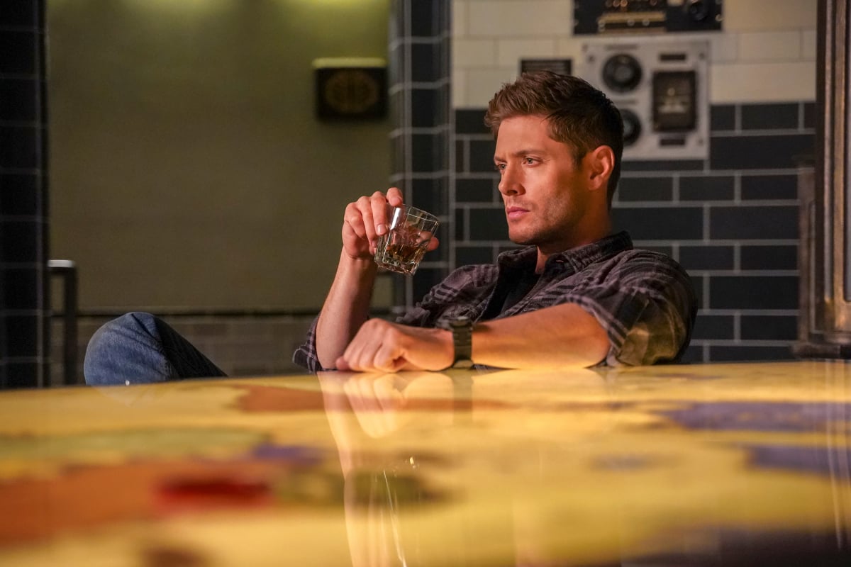 Jensen Ackles having a drink