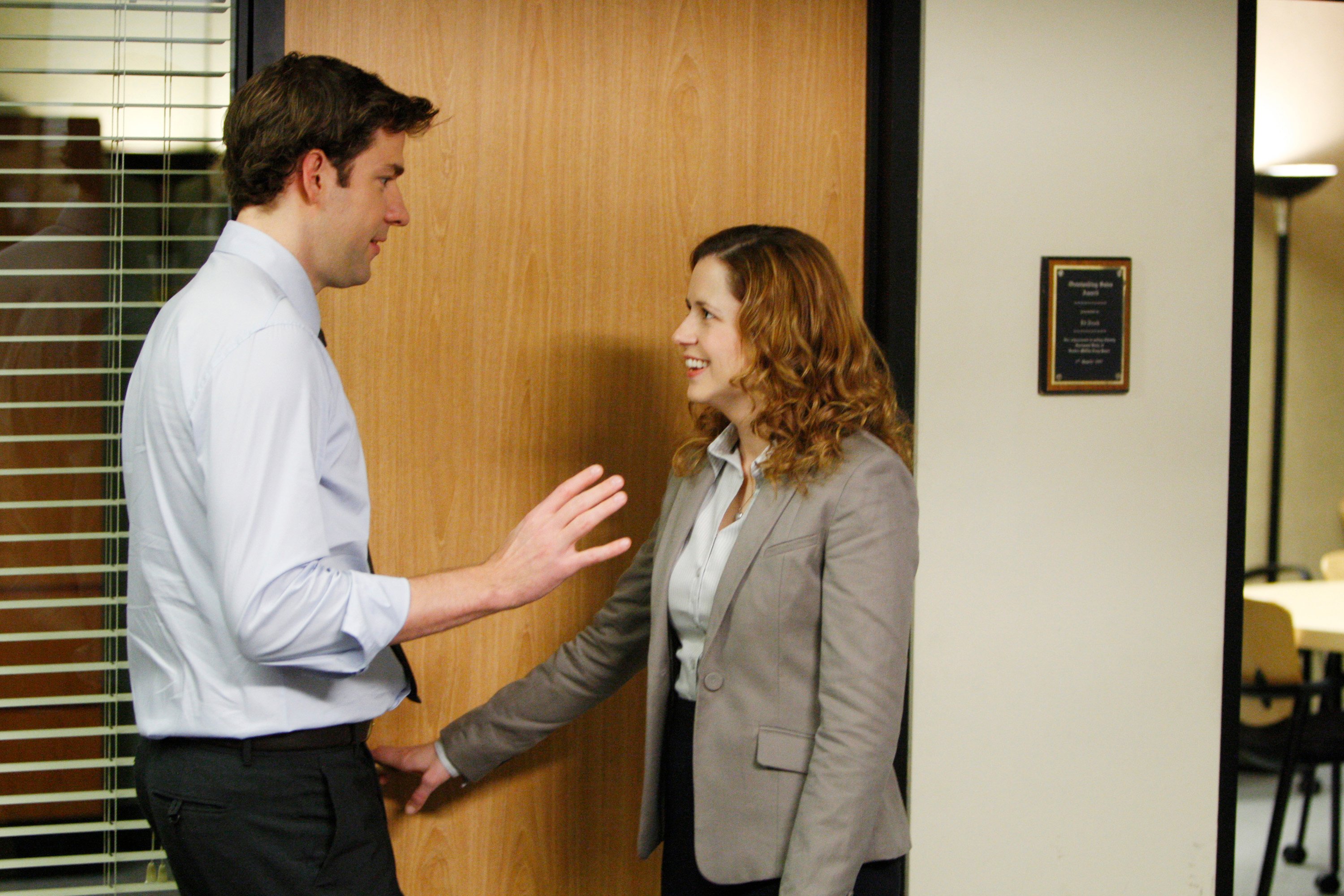 John Krasinski as Jim Halpert and Jenna Fischer as Pam Beesly