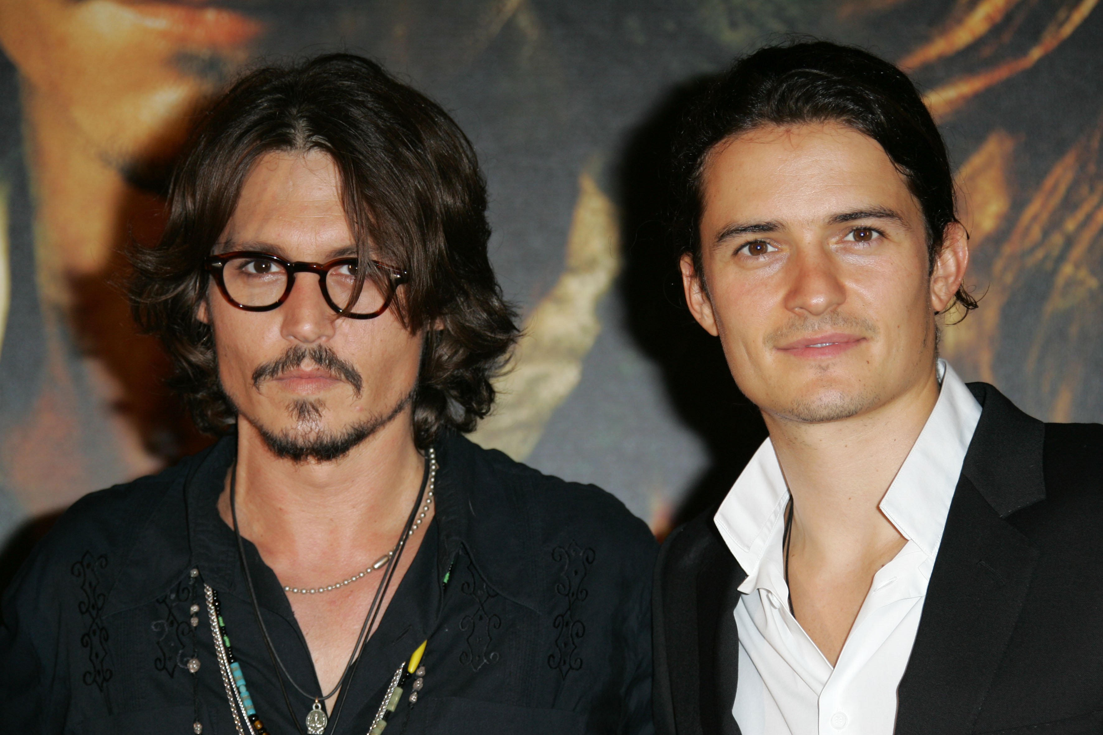 Johnny Depp and Orlando Bloom at the Gaumont Marignan Theater in Paris, France