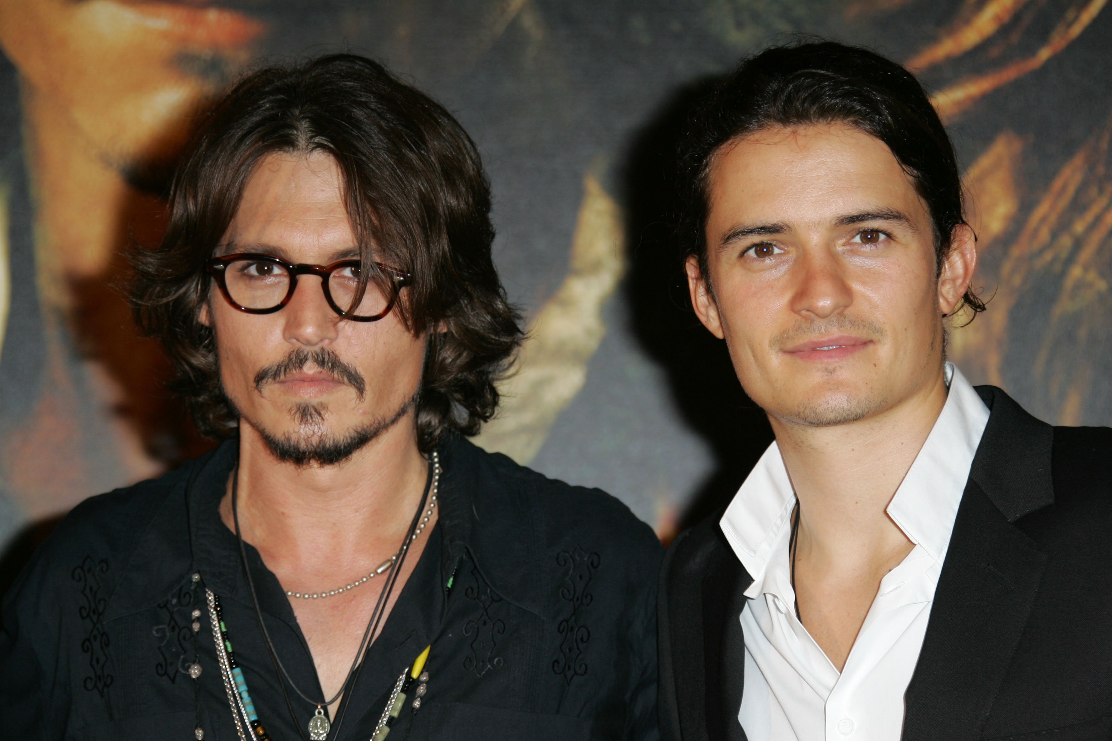 Johnny Depp and Orlando Bloom at the Gaumont Marignan Theater in Paris, France