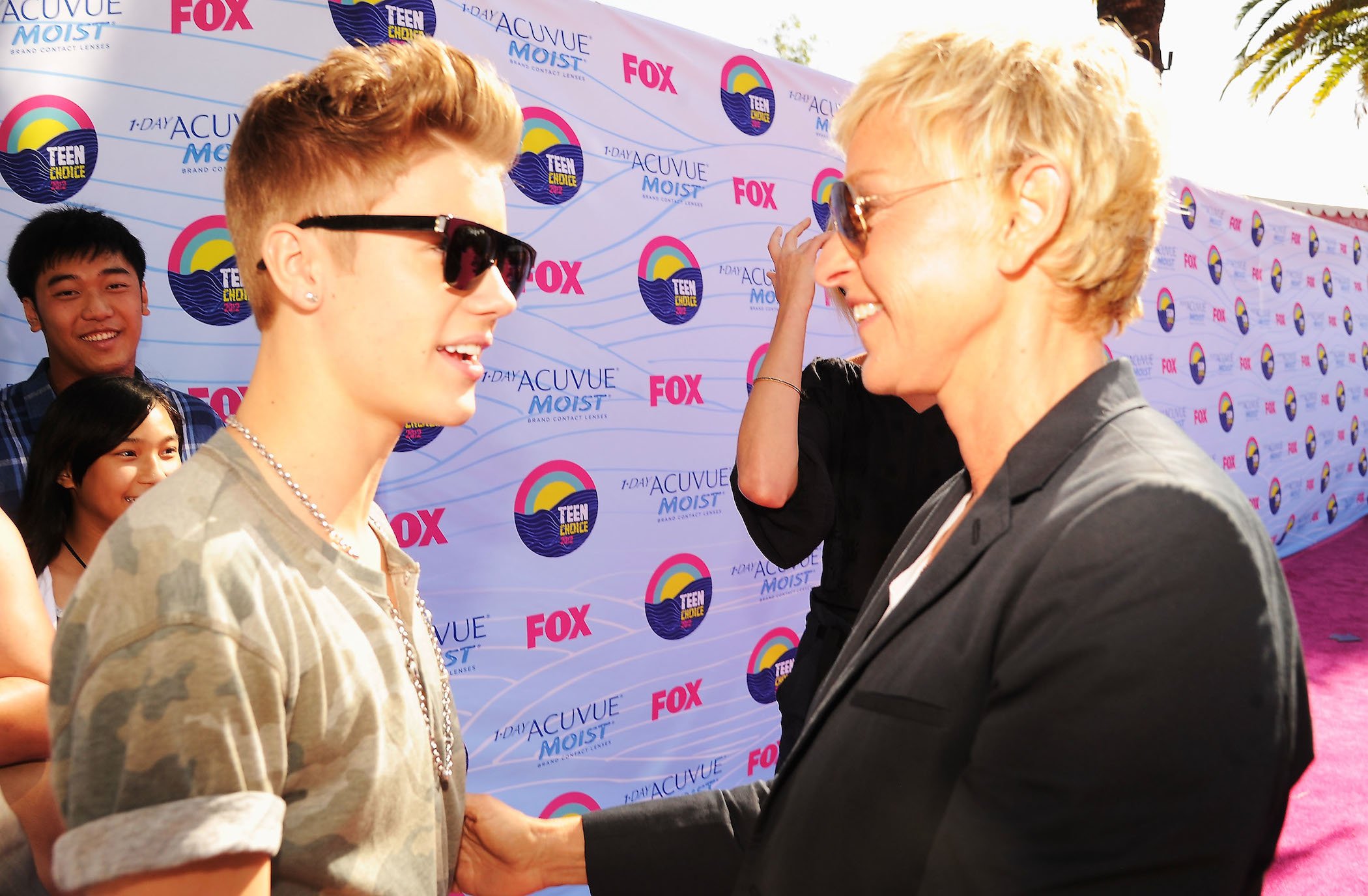 Justin Bieber and TV personality Ellen DeGeneres arrive at the 2012 Teen Choice Awards