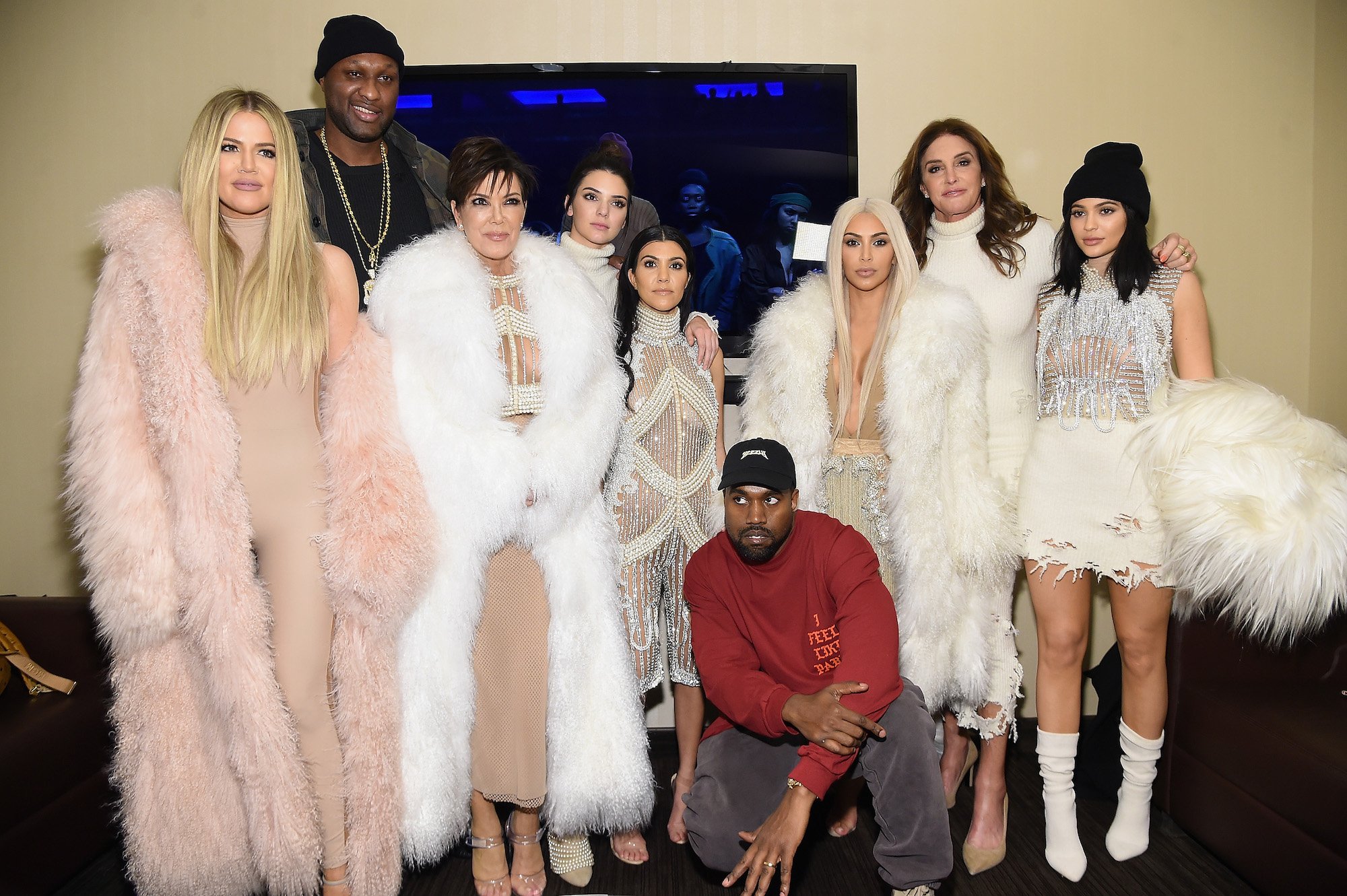 (L-R) Khloe Kardashian, Lamar Odom, Kris Jenner, Kendall Jenner, Kourtney Kardashian, Kanye West, Kim Kardashian, Caitlin Jenner and Kylie Jenner