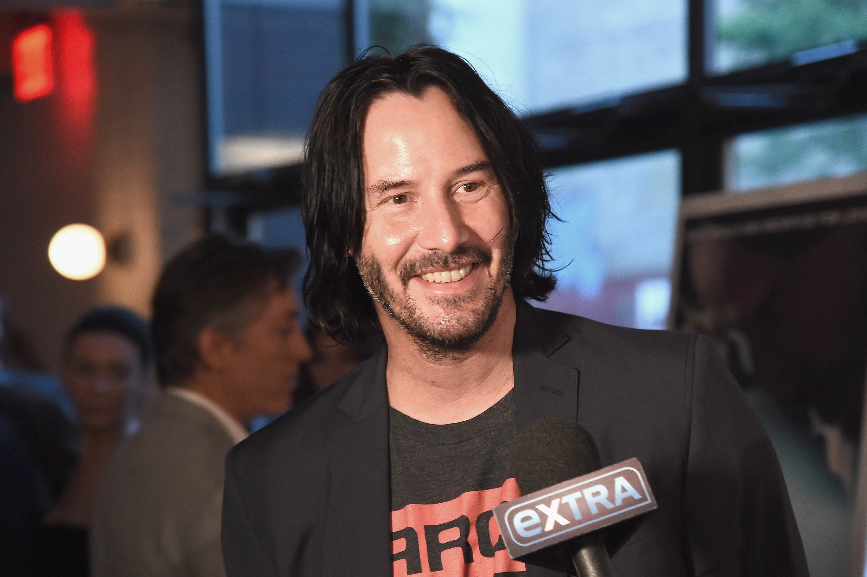 Keanu Reeves attending a film premiere