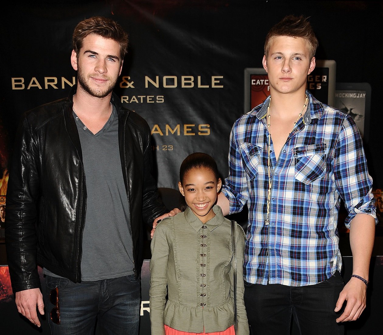 The Hunger Games cast members Liam Hemsworth, Amandla Stenberg, and Alexander Ludwig