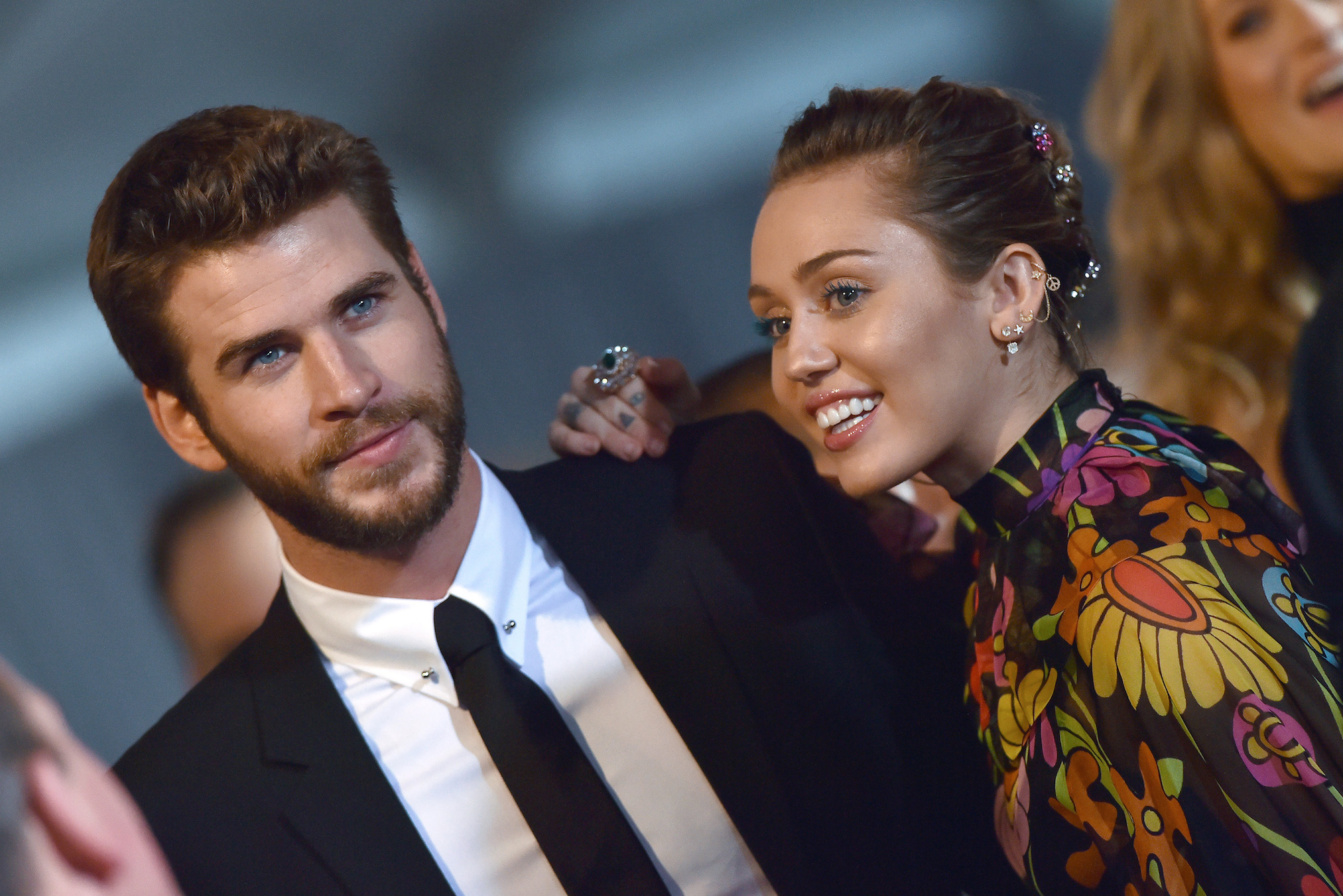 Liam Hemsworth and singer Miley Cyrus arrive at the premiere of Disney and Marvel's 'Thor: Ragnarok'