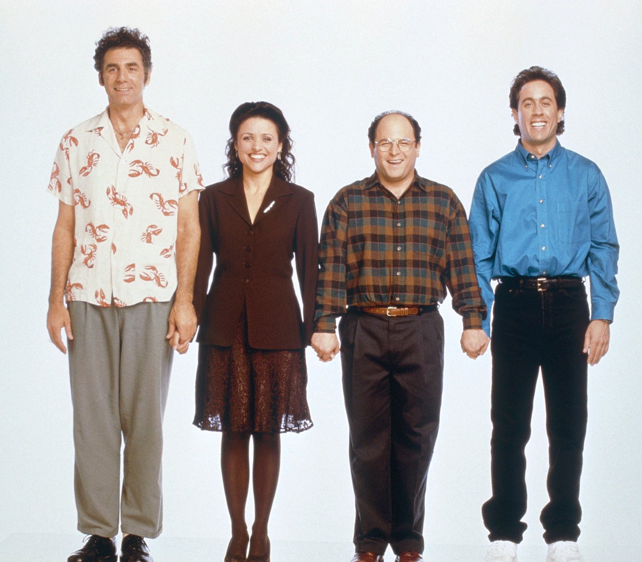 Michael Richards as Cosmo Kramer, Julia Louis-Dreyfus as Elaine Benes, Jason Alexander as George Costanza, and Jerry Seinfeld as himself on 'Seinfeld'