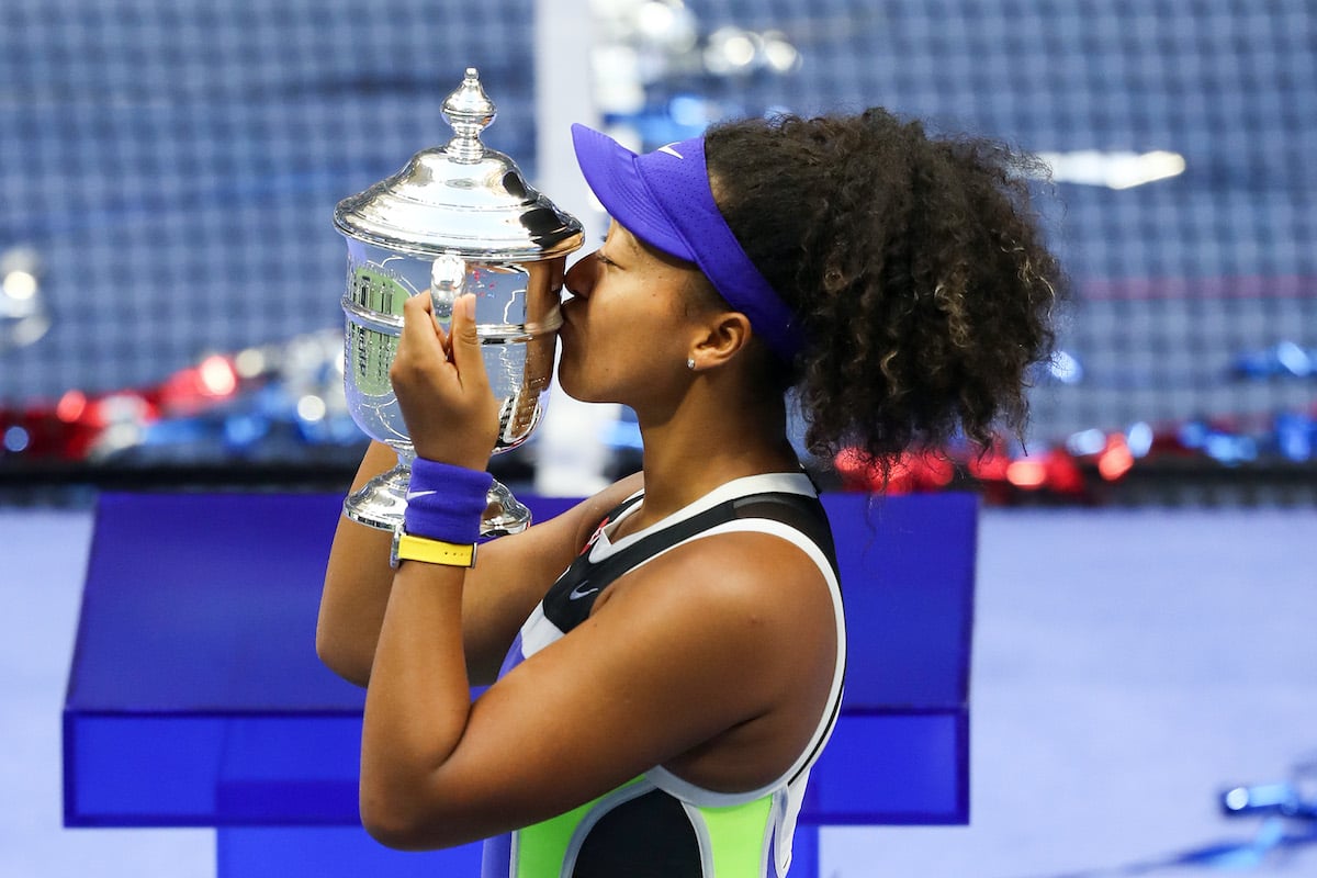 Naomi Osaka of Japan kisses the trophy in celebration after winning her Women's Singles final match against Victoria Azarenka of Belarus at the 2020 US Open