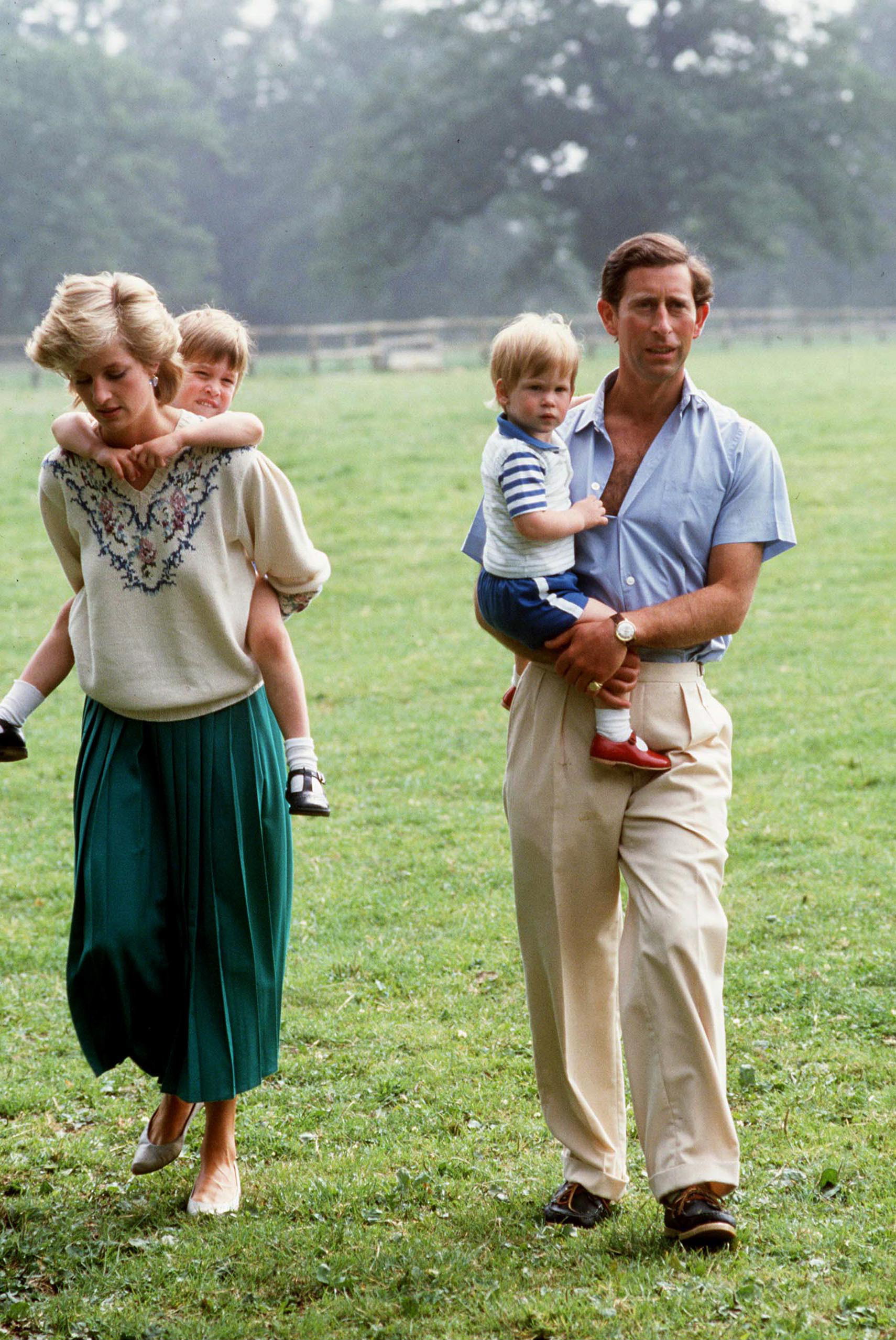 Prince Charles and Princess Diana with Princes William and Harry at Highgrove House